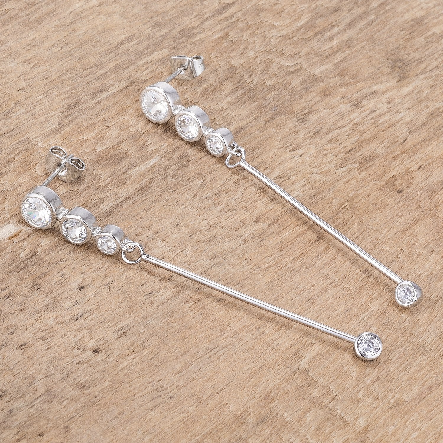 1.2Ct Graduated Rhodium Plated Drop Cubic Zirconia Earrings. - Charming Charlie