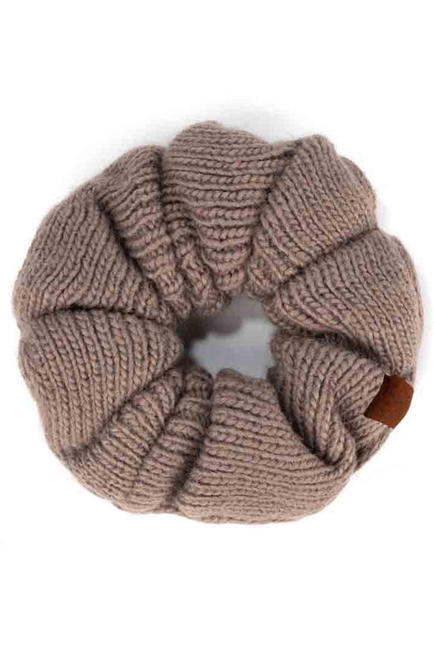 Earth Grey C.C. Soft Knit Scrunchies provide a stylish and comfortable way to keep your hair in place without causing damage. Made with soft knit material, they are gentle on your hair and perfect for everyday wear. Their scrunchy design also adds a trendy touch to your hairstyle