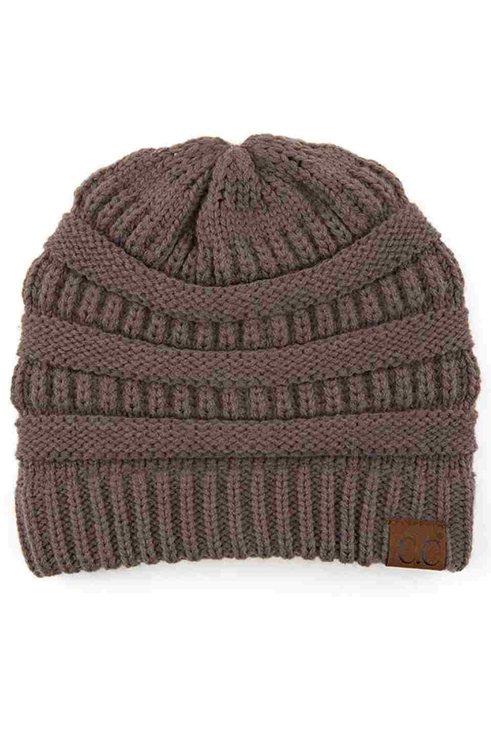 EarthGrey C.C Ribbed Knit Solid Color Beanie offers a timeless design with durable ribbed knitting, ensuring a snug and comfortable fit. Crafted for warmth and versatility, this beanie is perfect for everyday wear, providing reliable protection against cold weather while maintaining a sleek, minimalist style that complements any outfit. Its solid color adds understated appeal, making it an essential accessory for both casual and outdoor use.