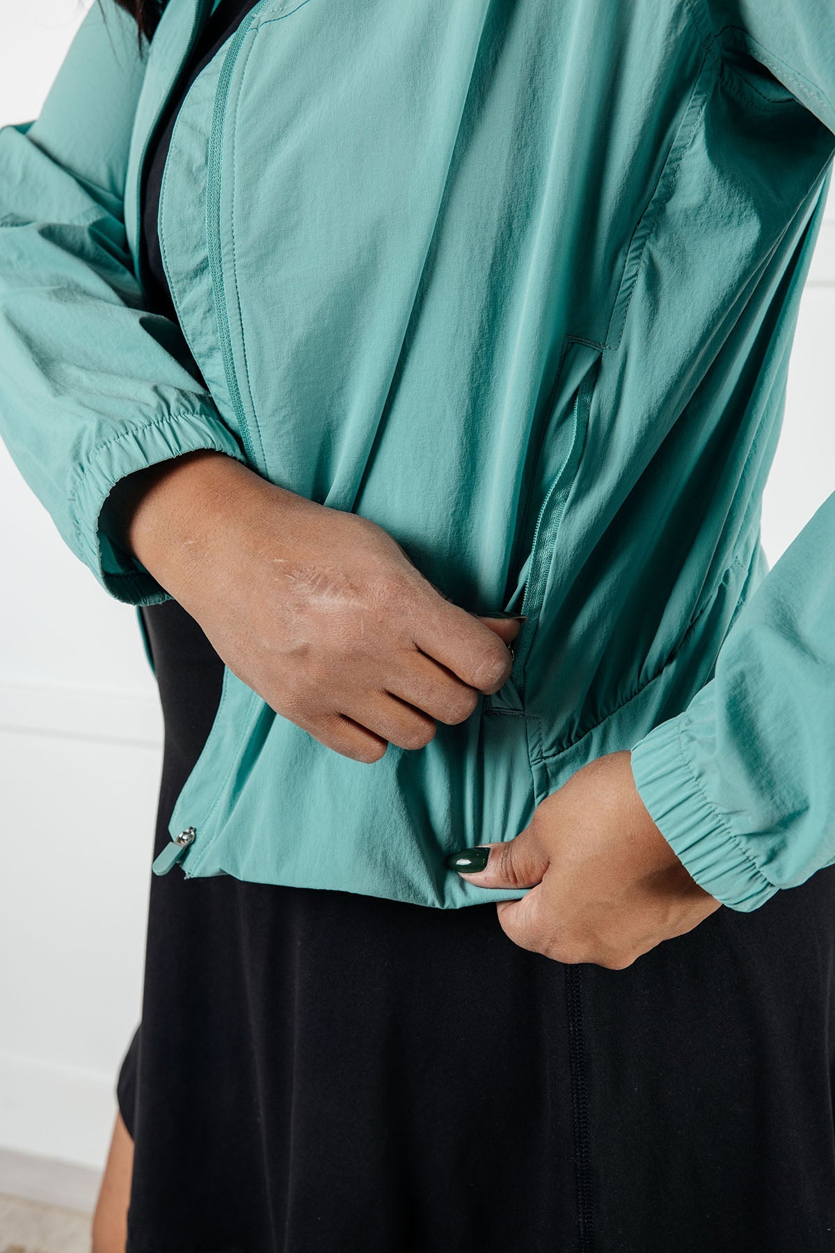 Fit Happens Nylon Tennis Jacket in Tidal Wave - Charming Charlie