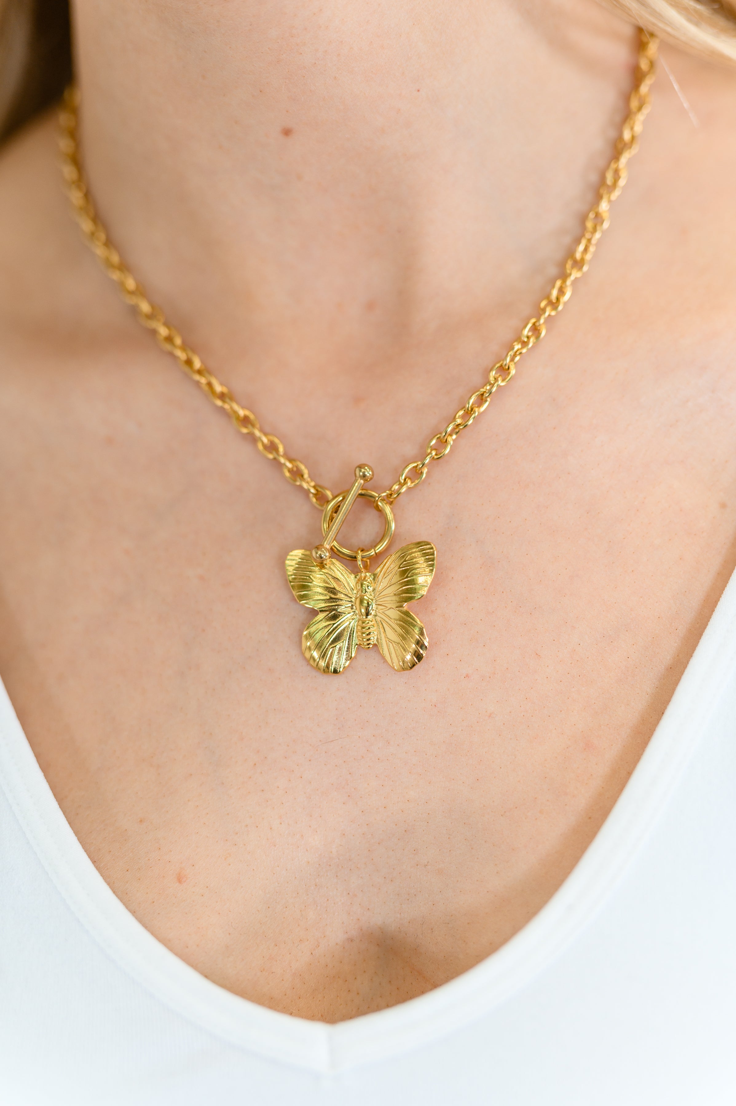 Flutter & Shine Butterfly Pendant Necklace in Gold - Charming Charlie