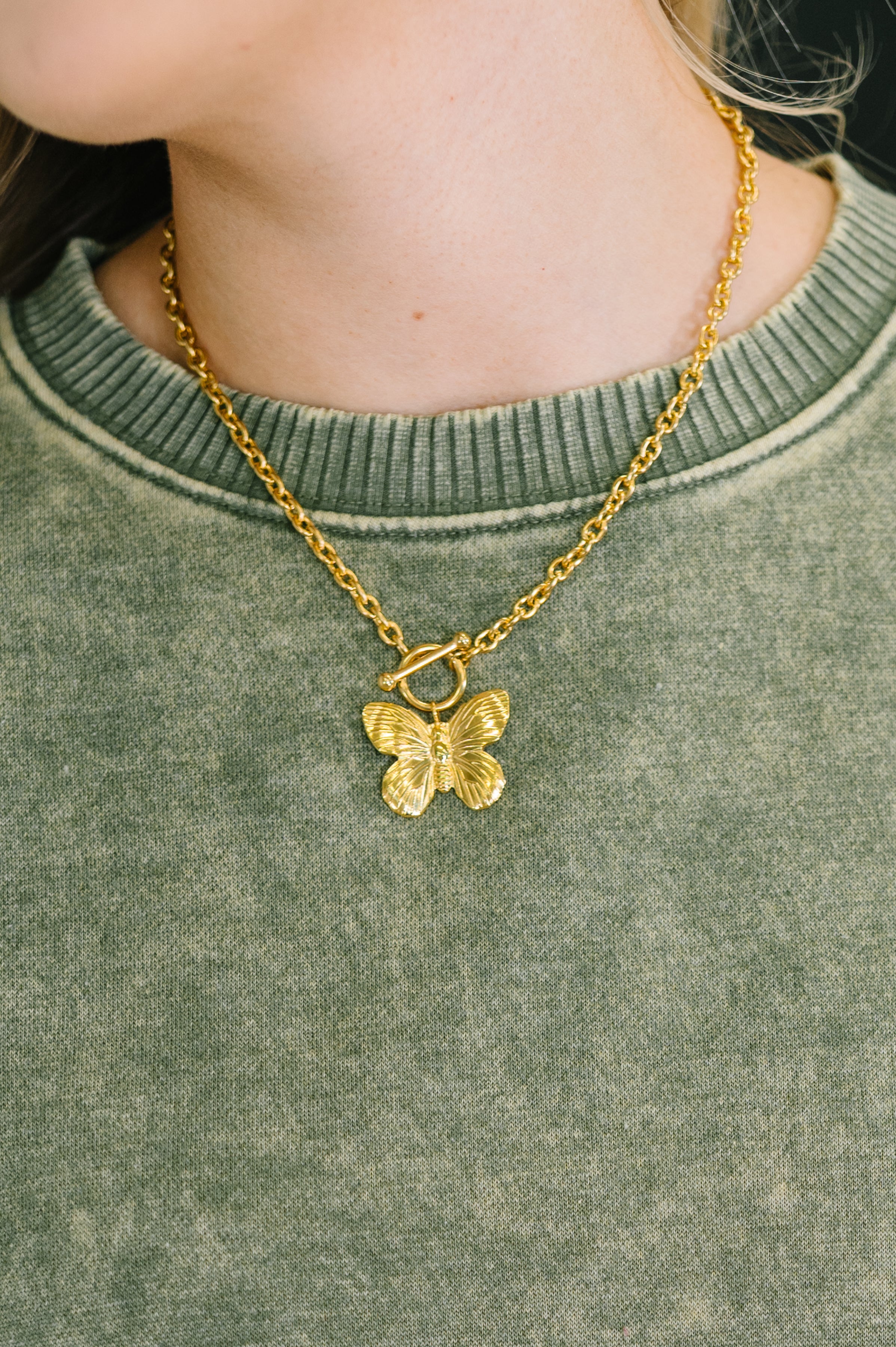 Flutter & Shine Butterfly Pendant Necklace in Gold - Charming Charlie