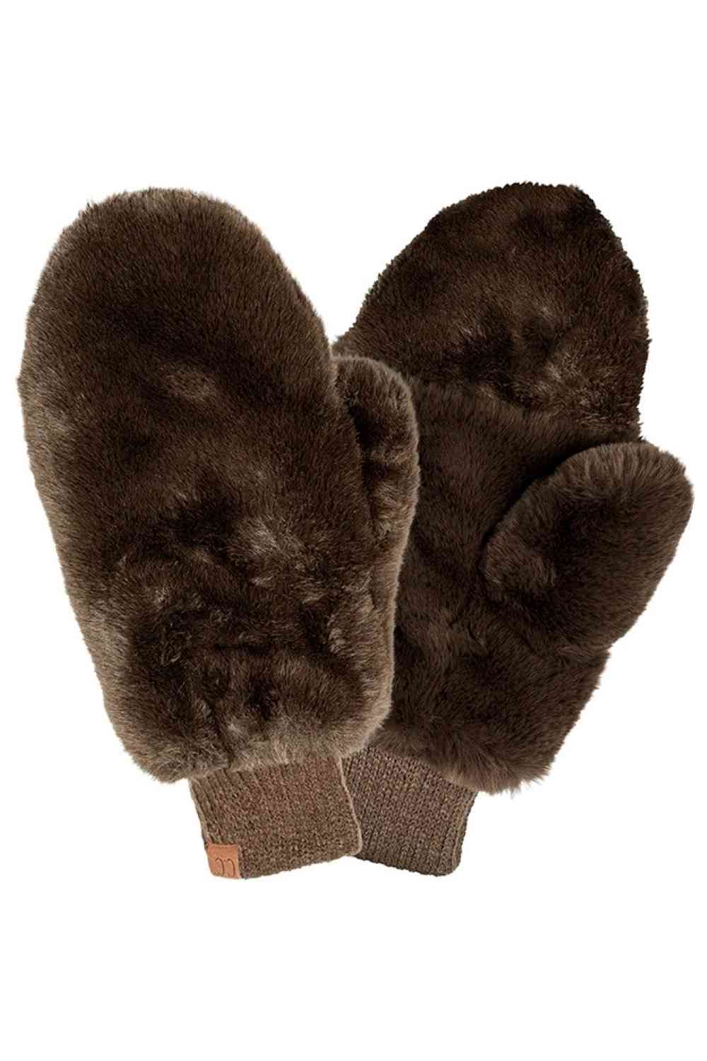 Brown CC Faux Fur Mittens With Shepherd Lining, are a smart, eye-catching, and attractive addition to your outfit. These trendy gloves keep you absolutely warm and toasty in the winter and cold weather outside. Accessorize the fun way with these gloves. It's the autumnal touch you need to finish your outfit in style. A pair of these gloves will be a nice gift for your family, friends, anyone you love, and even yourself.