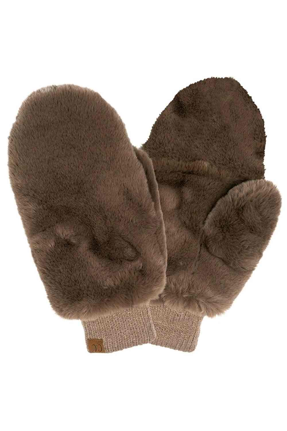 Chocolate CC Faux Fur Mittens With Shepherd Lining, are a smart, eye-catching, and attractive addition to your outfit. These trendy gloves keep you absolutely warm and toasty in the winter and cold weather outside. Accessorize the fun way with these gloves. It's the autumnal touch you need to finish your outfit in style. A pair of these gloves will be a nice gift for your family, friends, anyone you love, and even yourself.