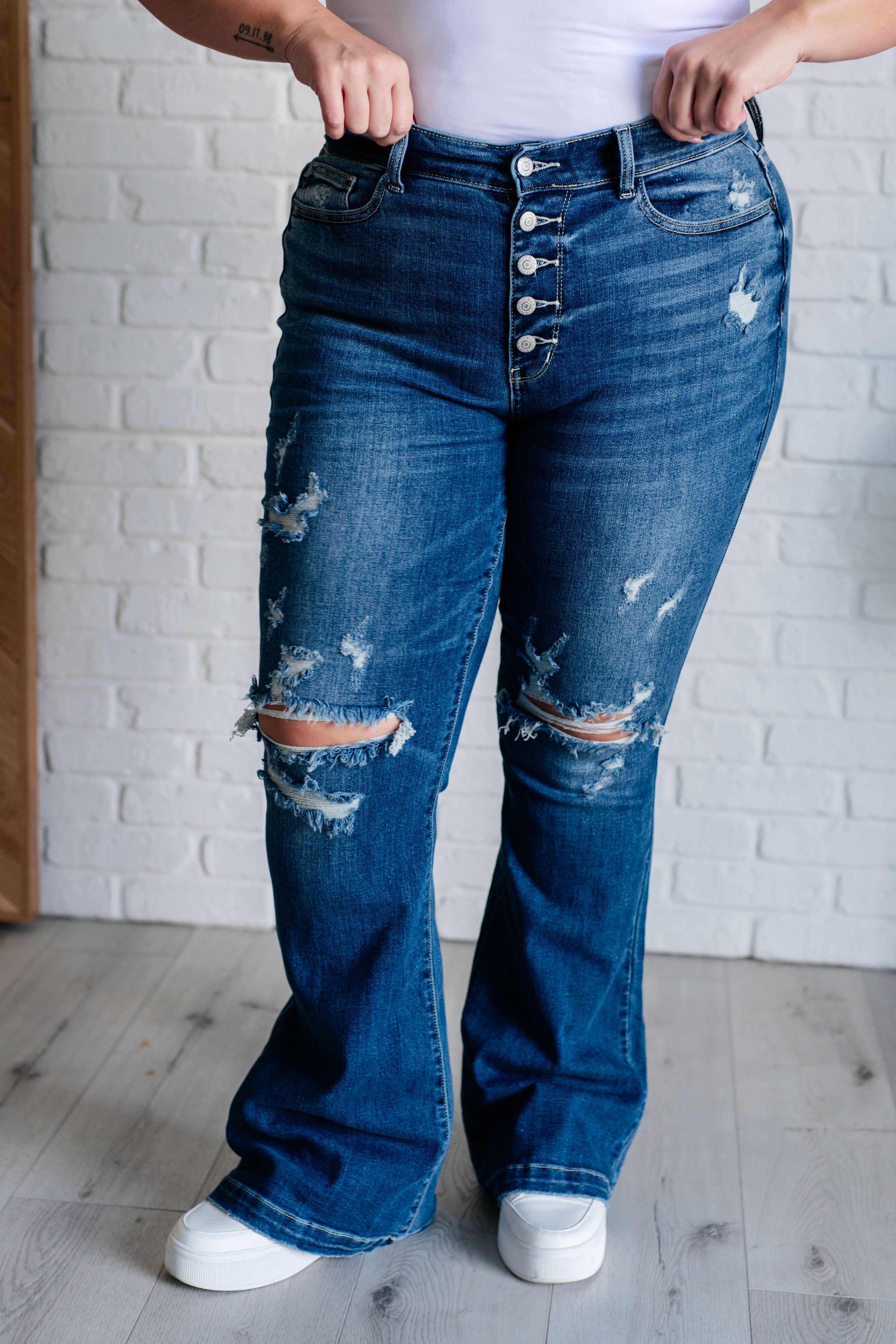 Gabriella Mid Rise Distressed Button Fly Flare - Charming Charlie
