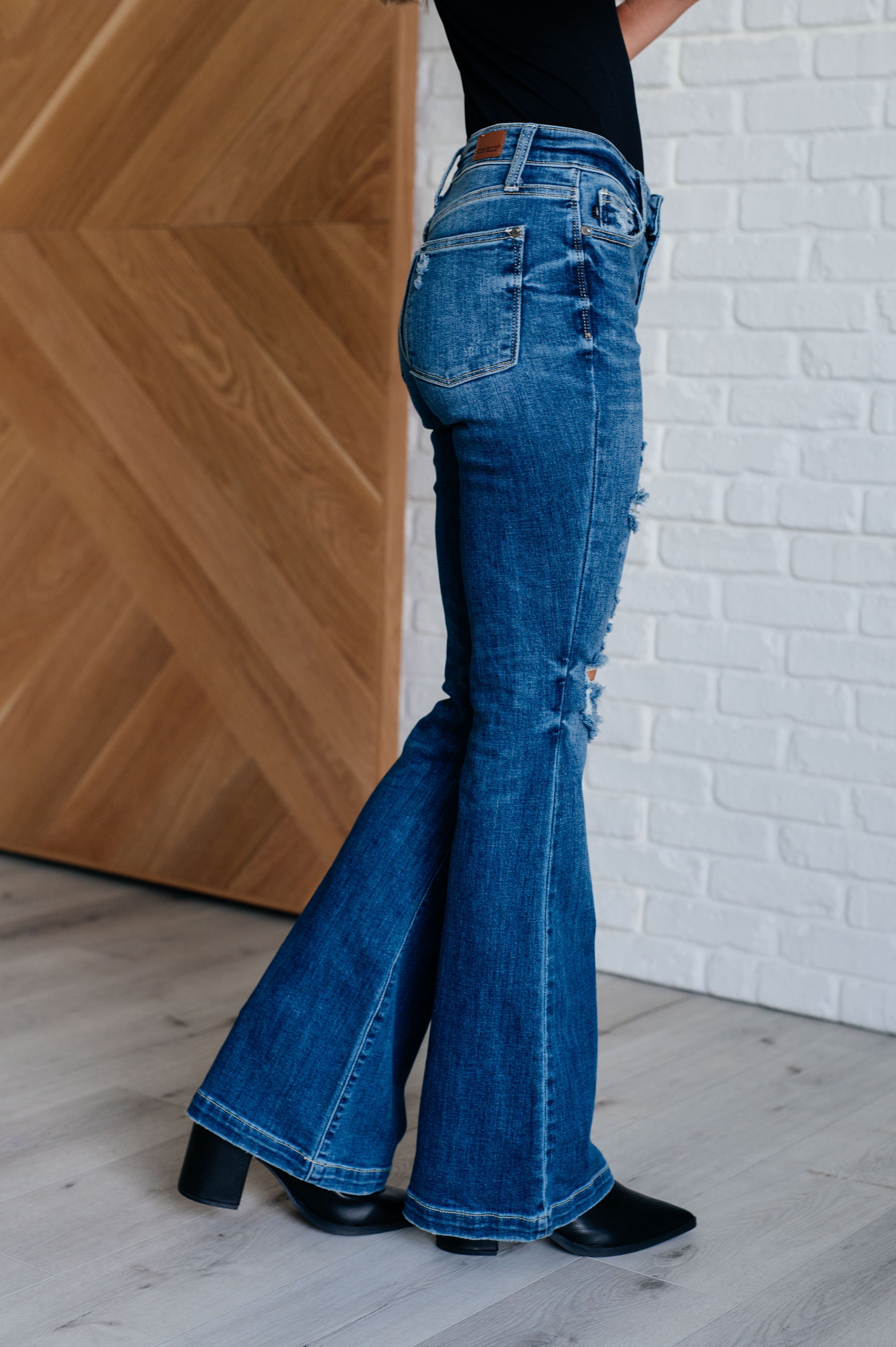 Gabriella Mid Rise Distressed Button Fly Flare - Charming Charlie