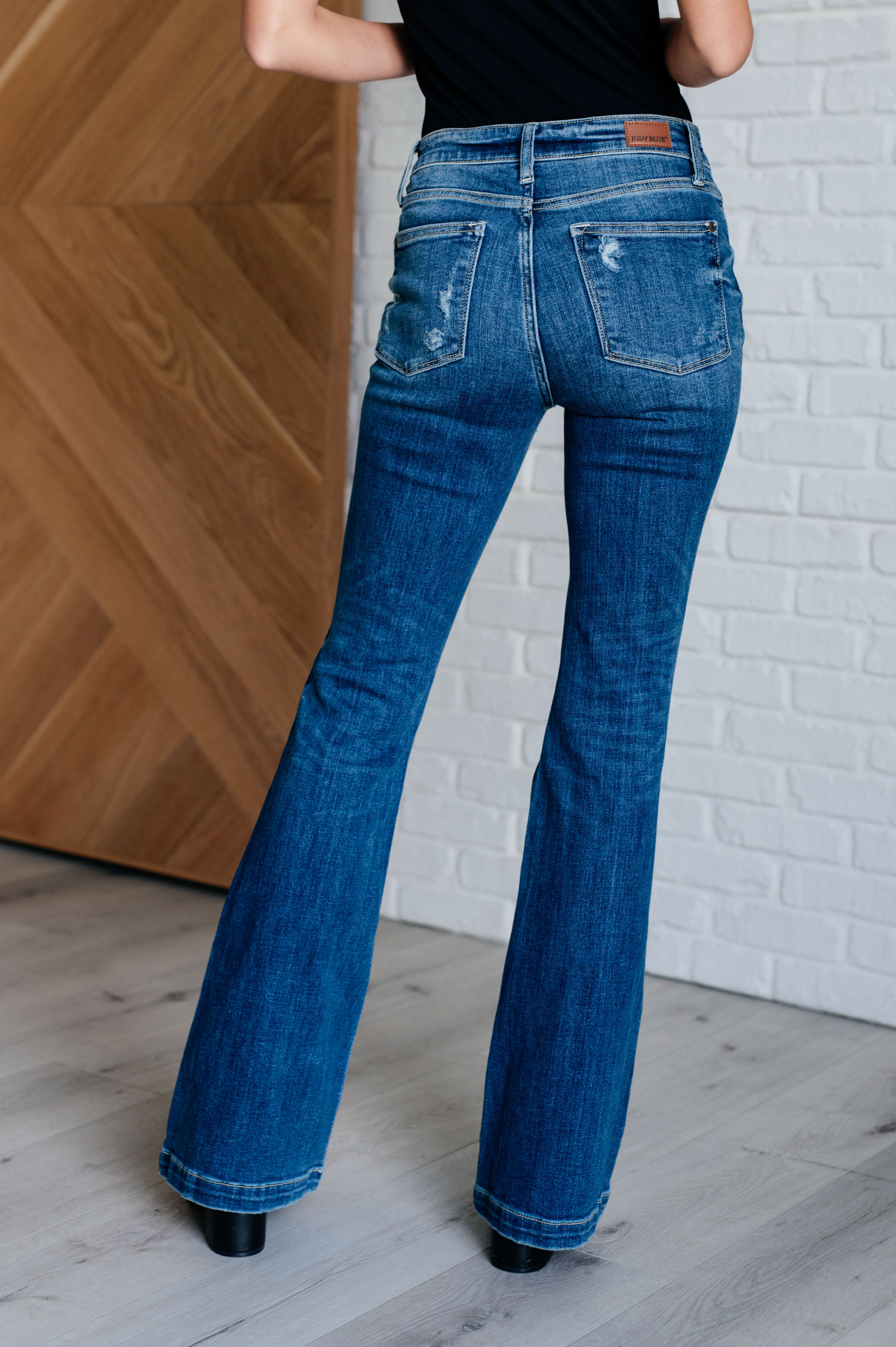Gabriella Mid Rise Distressed Button Fly Flare - Charming Charlie