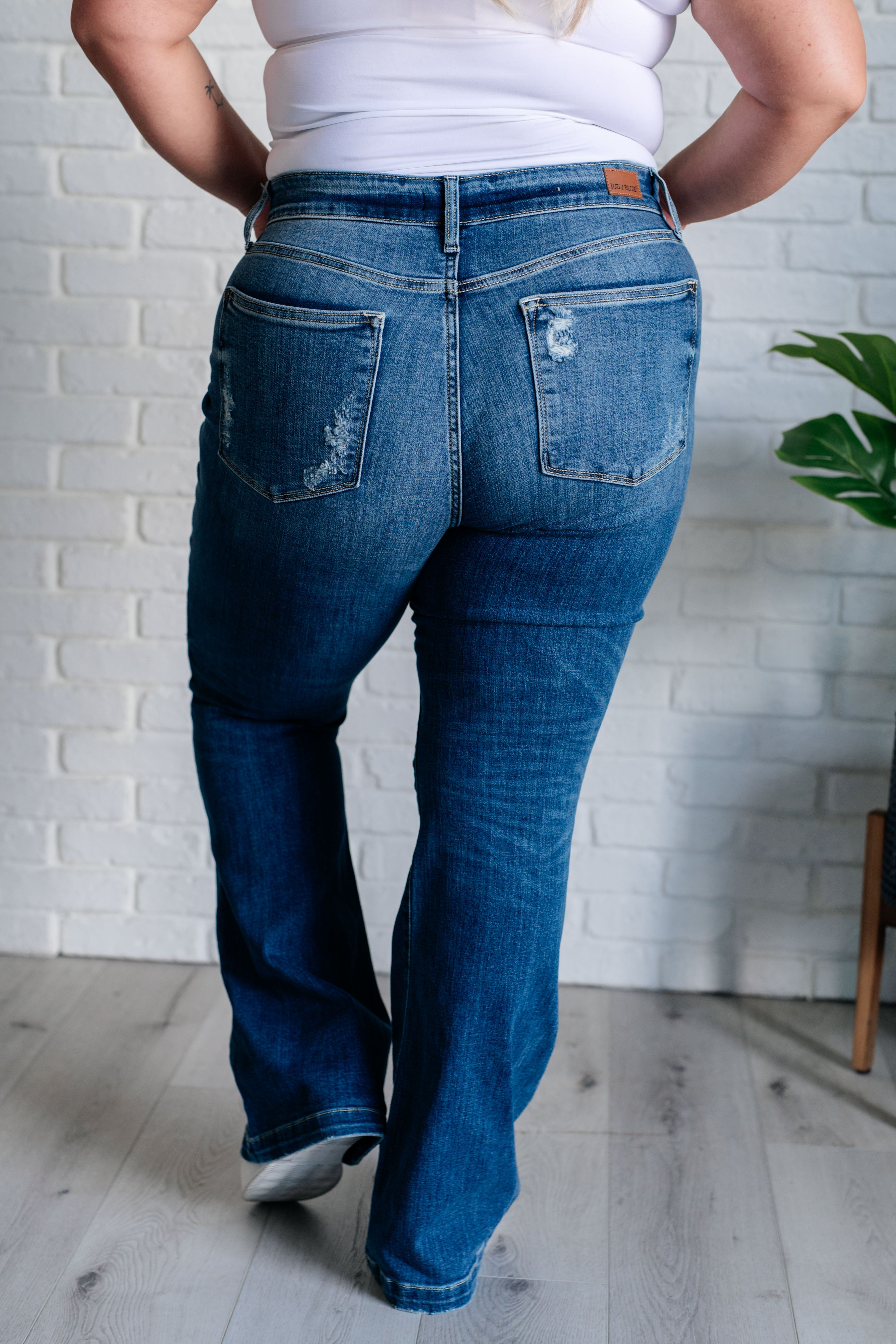 Gabriella Mid Rise Distressed Button Fly Flare - Charming Charlie