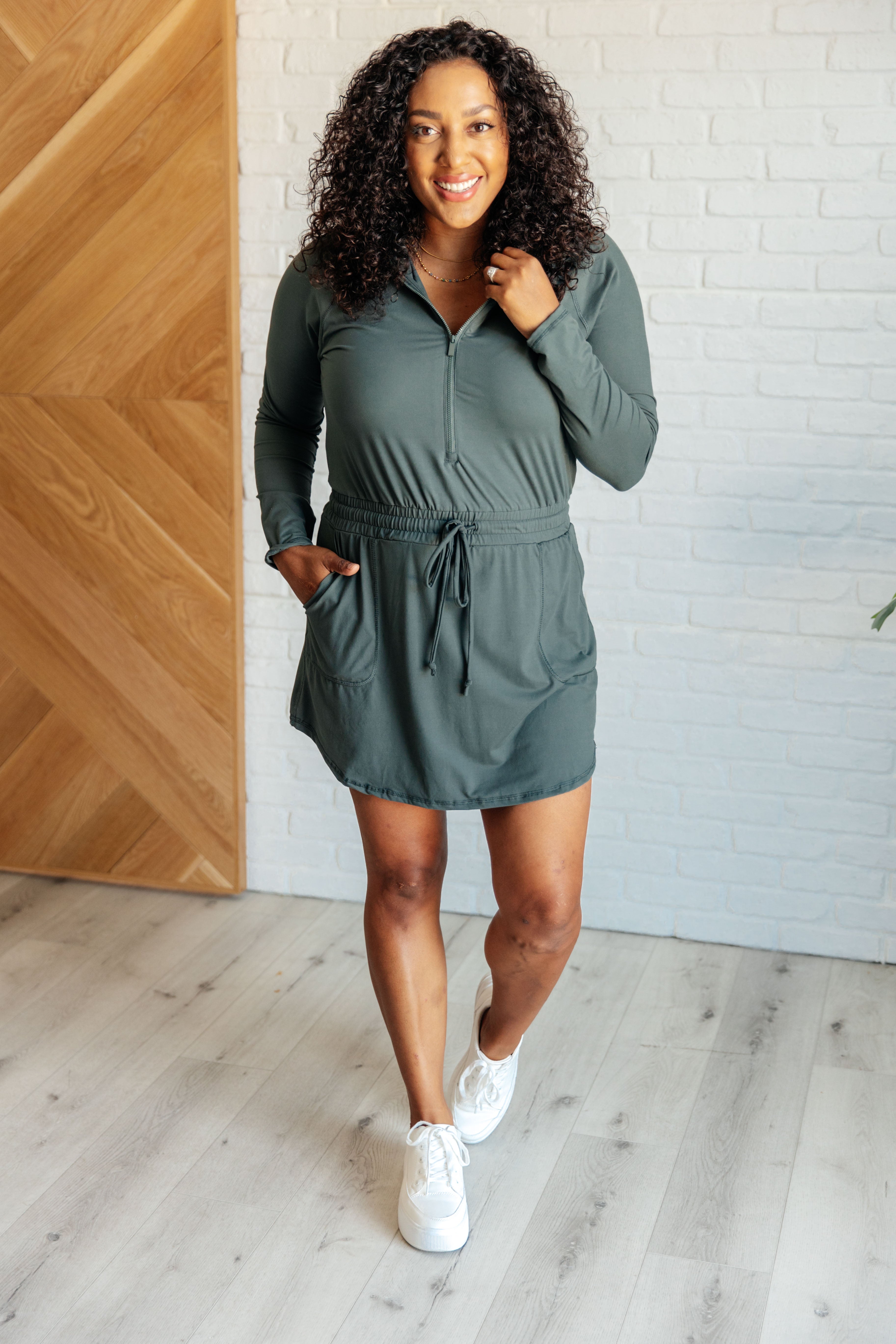 Getting Out Long Sleeve Hoodie Romper in Smoked Spruce - Charming Charlie