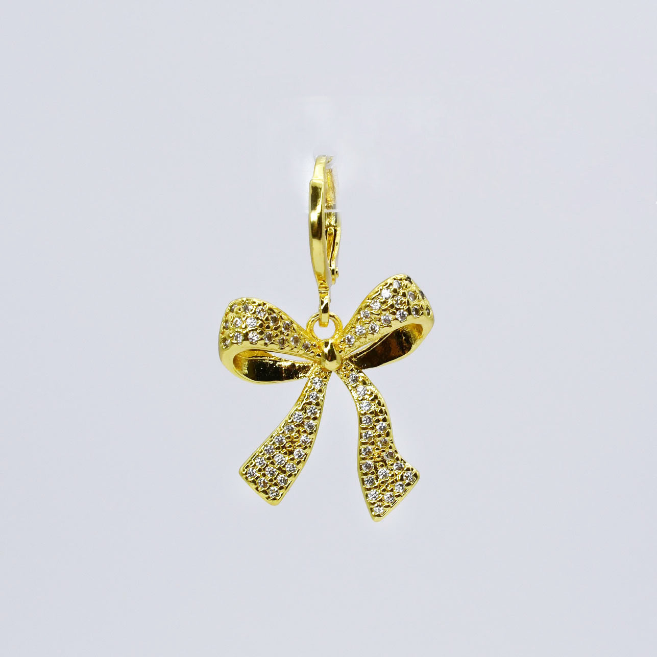 Gold Ribbon Charm - Charming Charlie