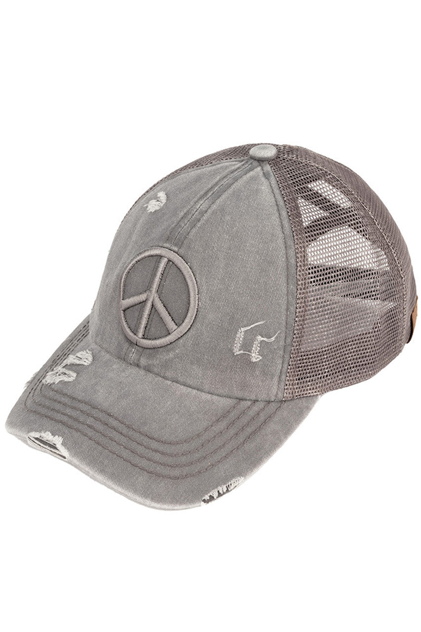 Gray C.C PEACE SIGN DISTRESSED PONY CAP - the perfect addition to your wardrobe for a trendy look. Made from high-quality materials, this cap features a peace sign design and distressed details that add character and edge to any outfit. Stay stylish and spread good vibes with this cap.
