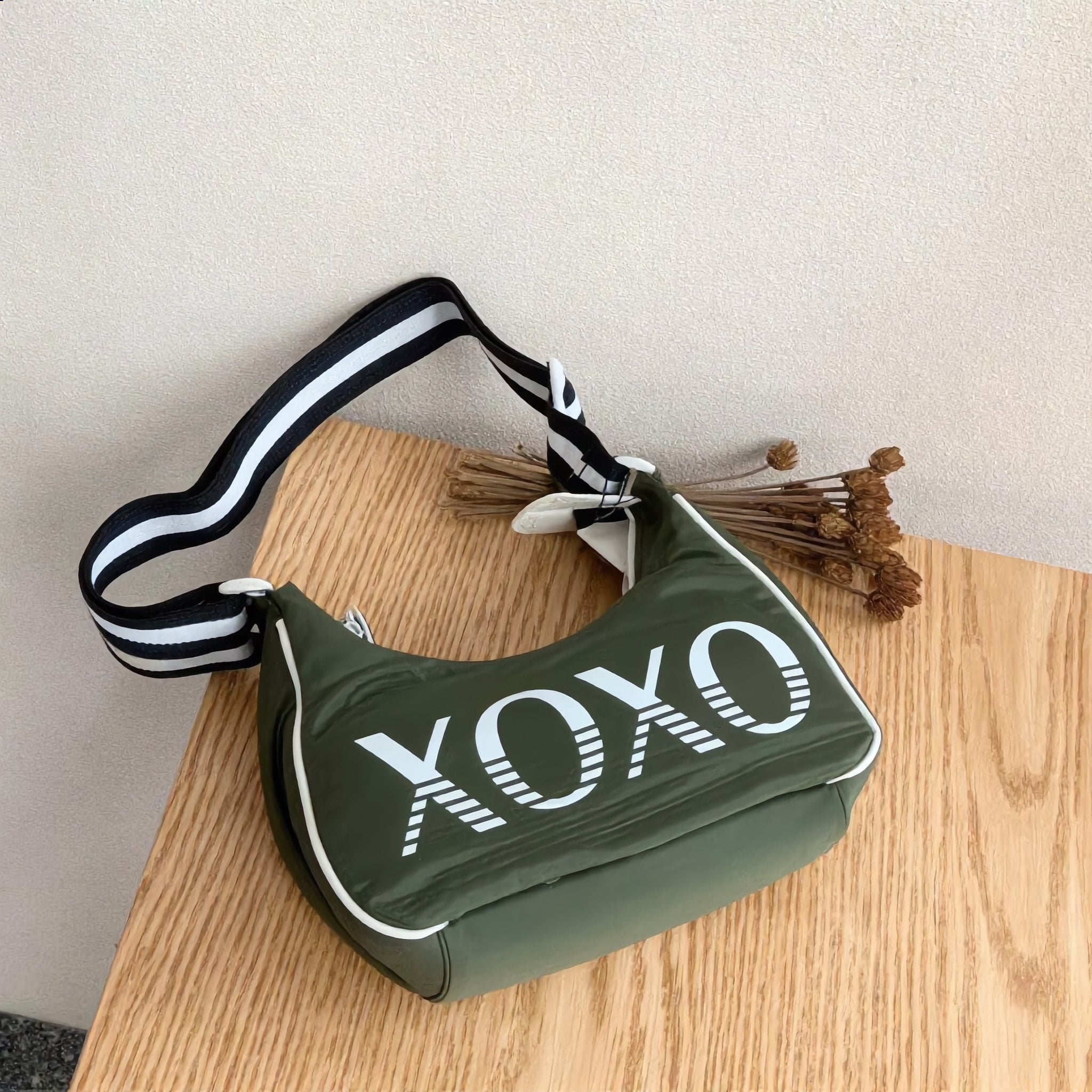 XOXO Green Nylon Cross Body Bag - Charming Charlie