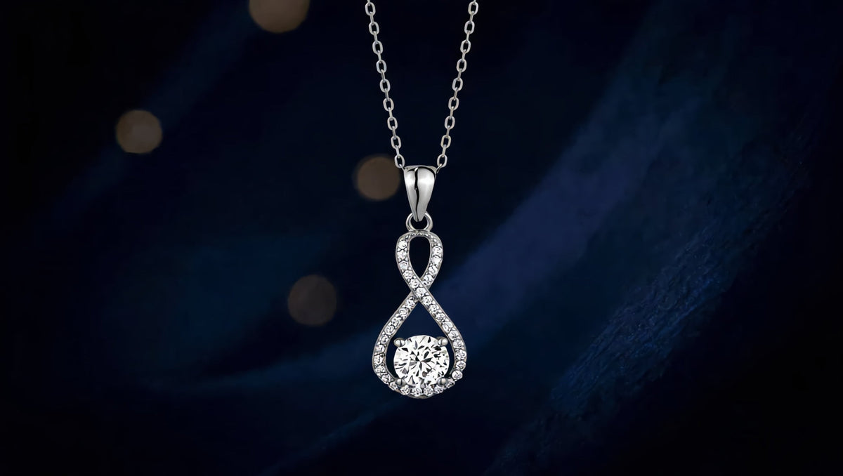 GL Creations- Sterling Silver CZ Infinity Pendant with Center Stone - Charming Charlie