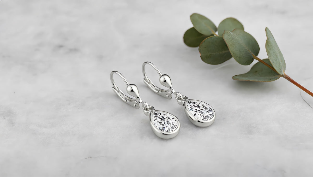 GL Creations- Sterling Silver Pear-Shaped Bezel CZ Leverback - Charming Charlie