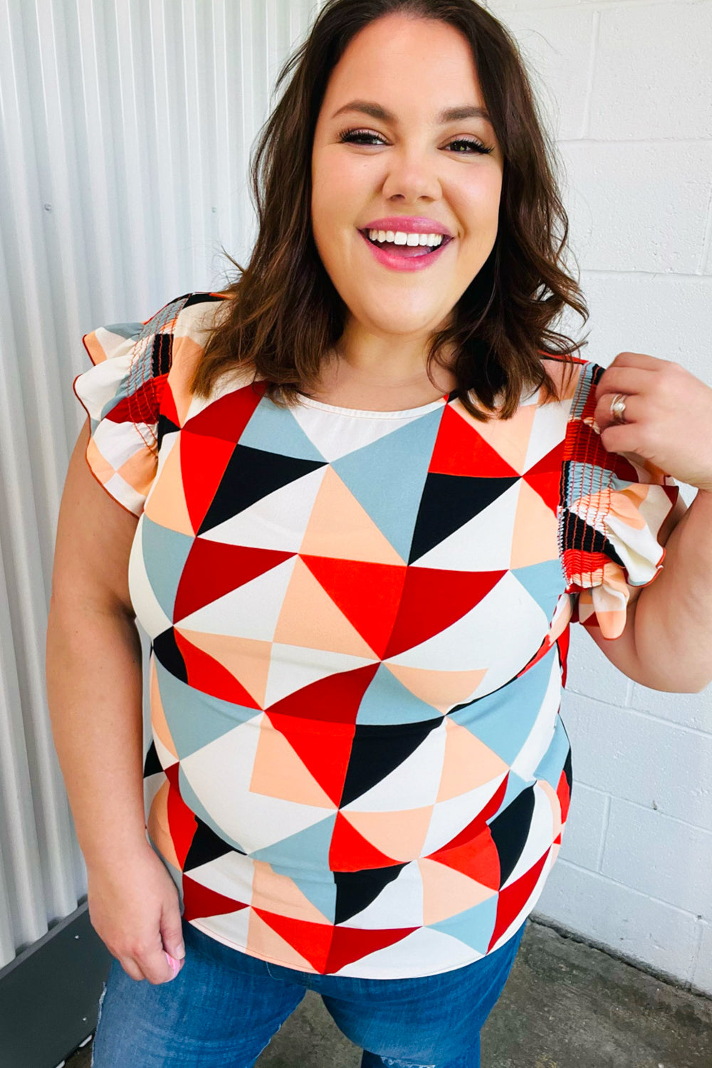 Burnt Orange Geo Print Smocked Ruffle Frill Sleeve Top - Charming Charlie