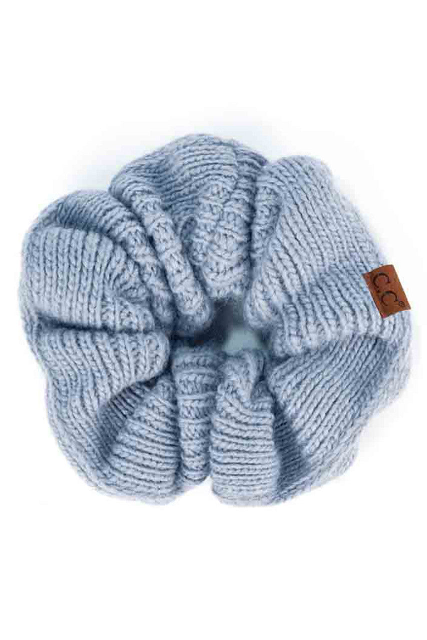 Ice Blue C.C. Soft Knit Scrunchies provide a stylish and comfortable way to keep your hair in place without causing damage. Made with soft knit material, they are gentle on your hair and perfect for everyday wear. Their scrunchy design also adds a trendy touch to your hairstyle