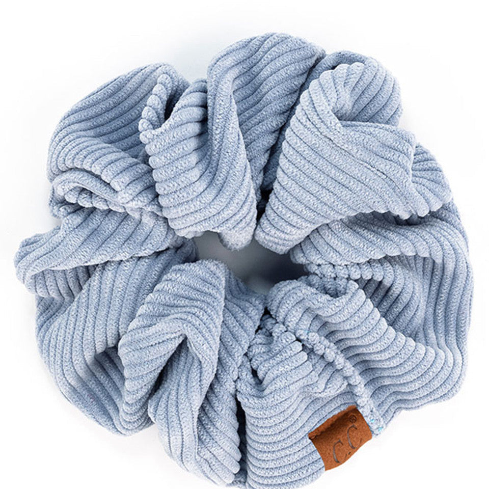 Ice Blue C.C Corduroy Solid Color Soft Scrunchies are a must-have for any hair accessory collection. Made from soft and durable corduroy material, these scrunchies are perfect for any hair type and can hold hair in place comfortably without causing any damage. Add some style to your hairstyle with these versatile and fashionable scrunchies.