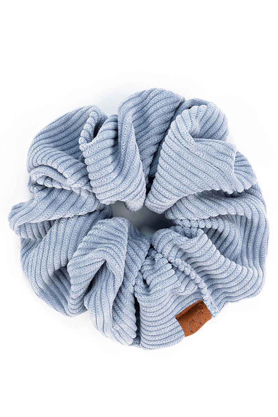 Ice Blue C.C Corduroy Solid Color Soft Scrunchies are a must-have for any hair accessory collection. Made from soft and durable corduroy material, these scrunchies are perfect for any hair type and can hold hair in place comfortably without causing any damage. Add some style to your hairstyle with these versatile and fashionable scrunchies.