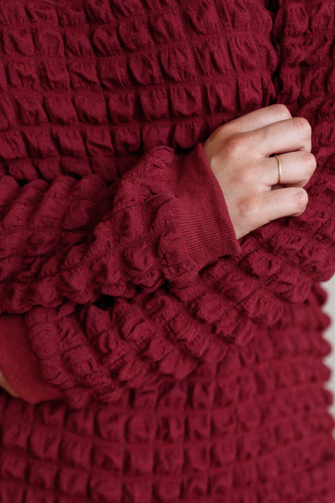 In Denial Bubble Pullover - Charming Charlie