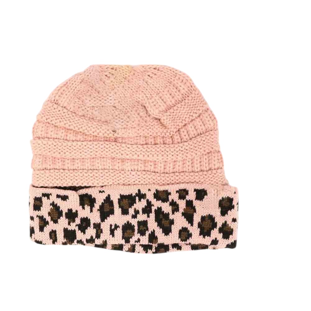 IndiePink Matching Cuff Leopard Print CC Beanie Tail combines bold leopard patterning with a cozy cuff for an effortlessly stylish accessory. Designed with an extended tail shape, this beanie provides a comfortable fit while adding a fashionable edge to your cold-weather wardrobe. Its soft, durable fabric ensures warmth and long-lasting wear, making it a practical choice for everyday use with a distinctive flair.