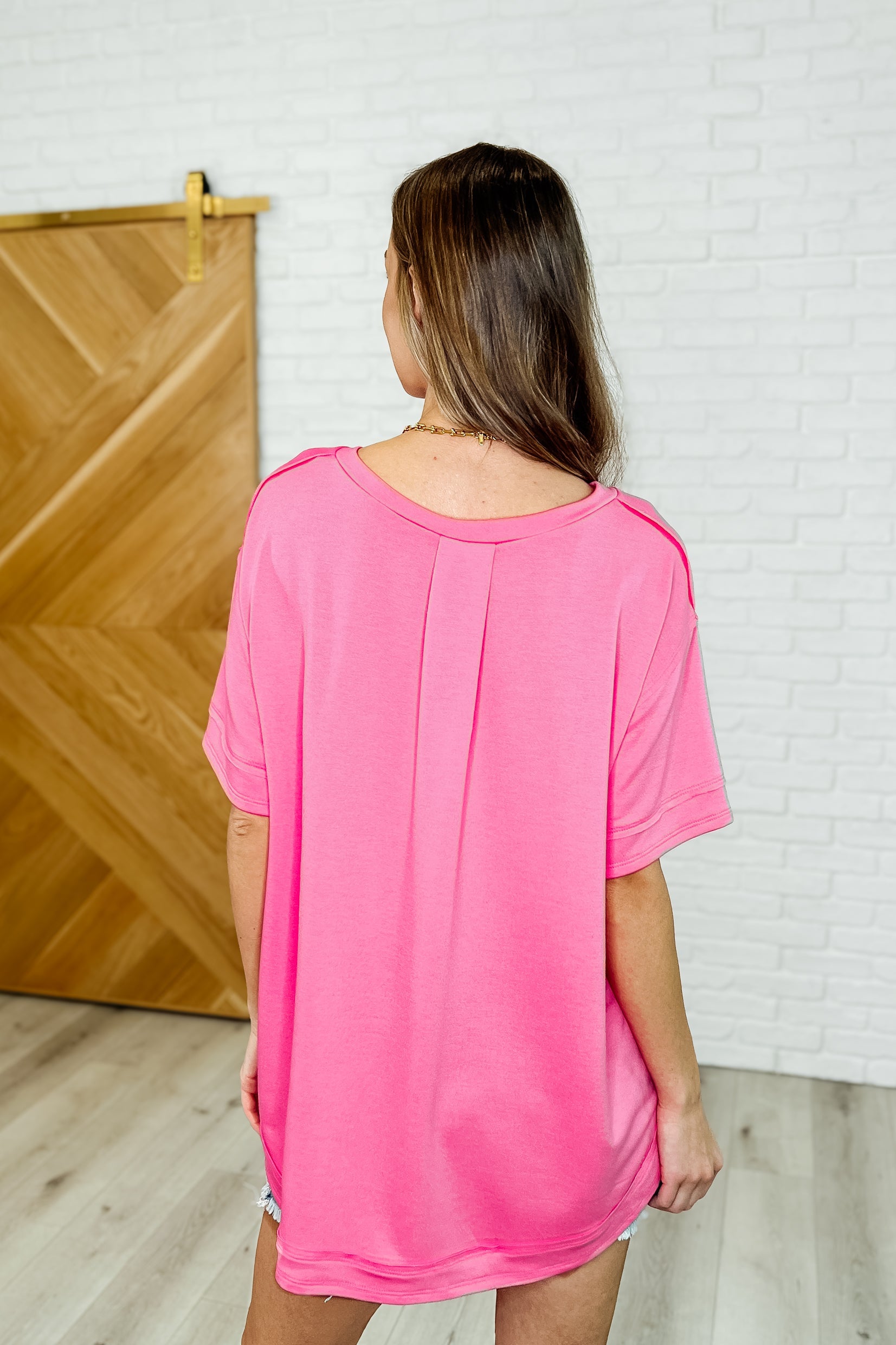 In the Rotation Exposed Seam Tee in Hot Pink - Charming Charlie