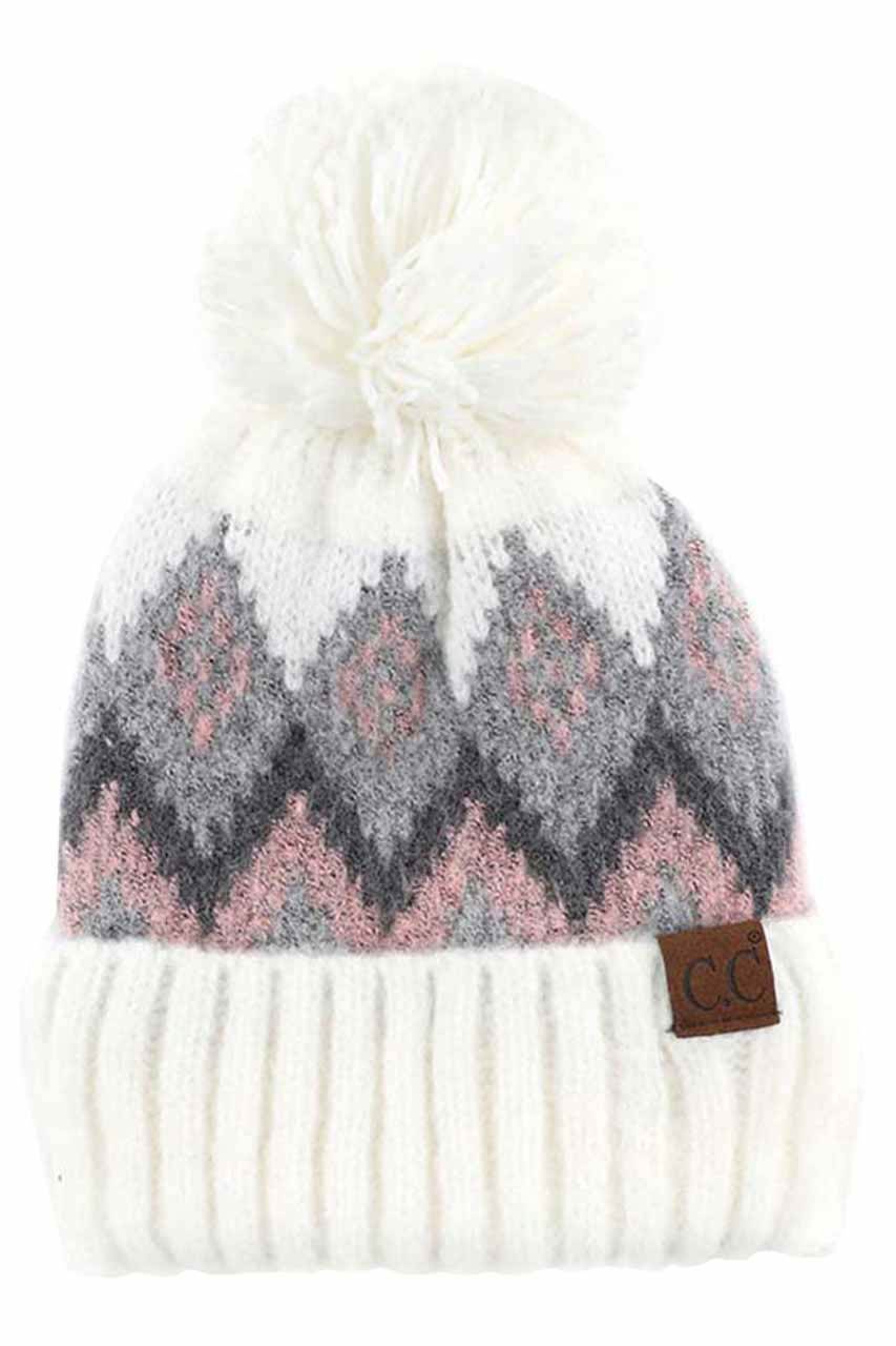 Ivory C C Soft Aztec Pattern Beanie with Knit Pom, is beautifully knitted with variety of colors and design that brings a unique look. Coordinate with any outfit to match the best with absolute warmth and coziness in style. This is an ideal winter head cover that comes in one size winter cap with a pom that fits most head sizes. Perfect winter gift accessory for your friends, family and the persons you love.