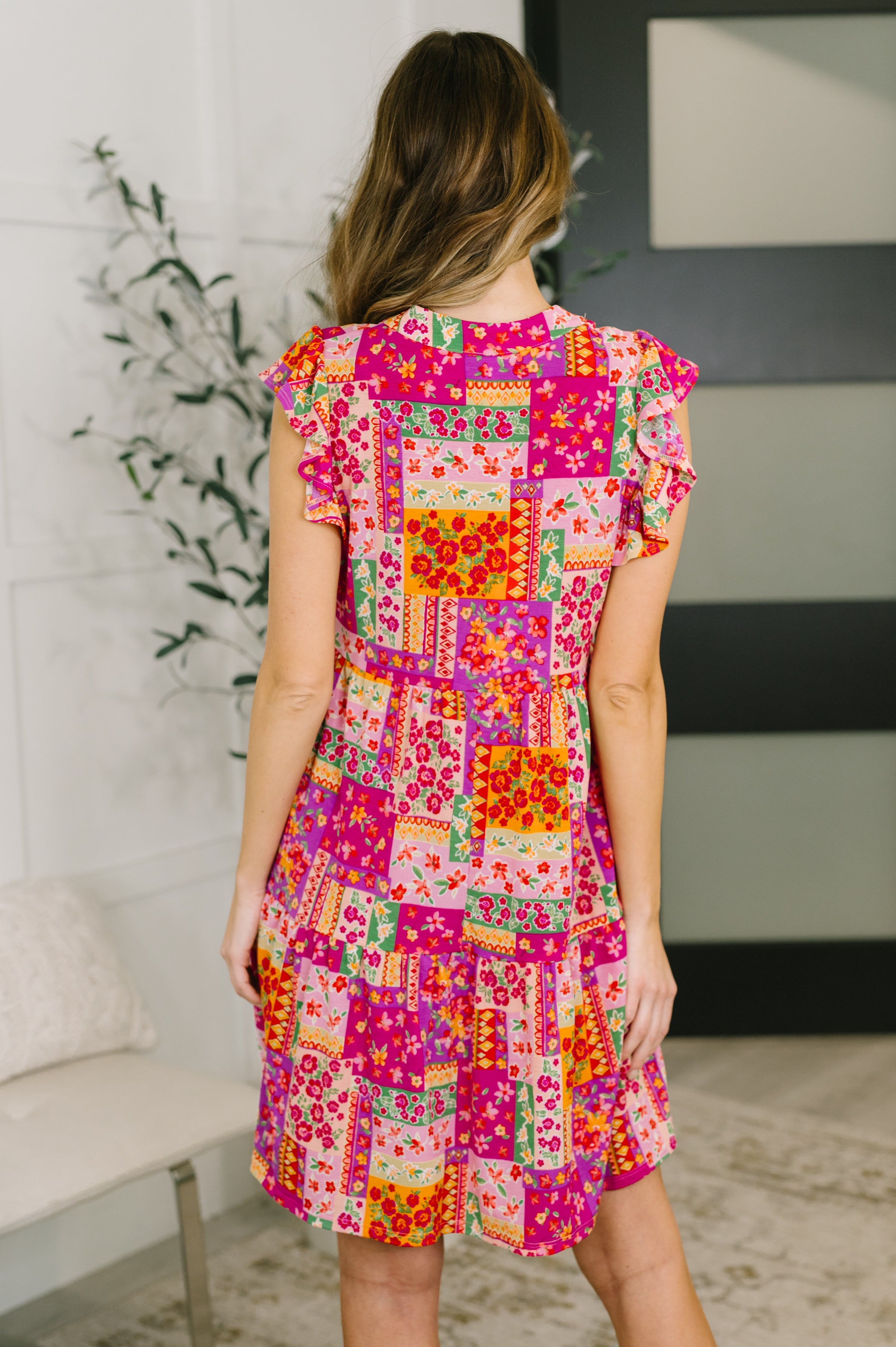 Lizzy Flutter Sleeve Dress in Patchwork Floral - Charming Charlie