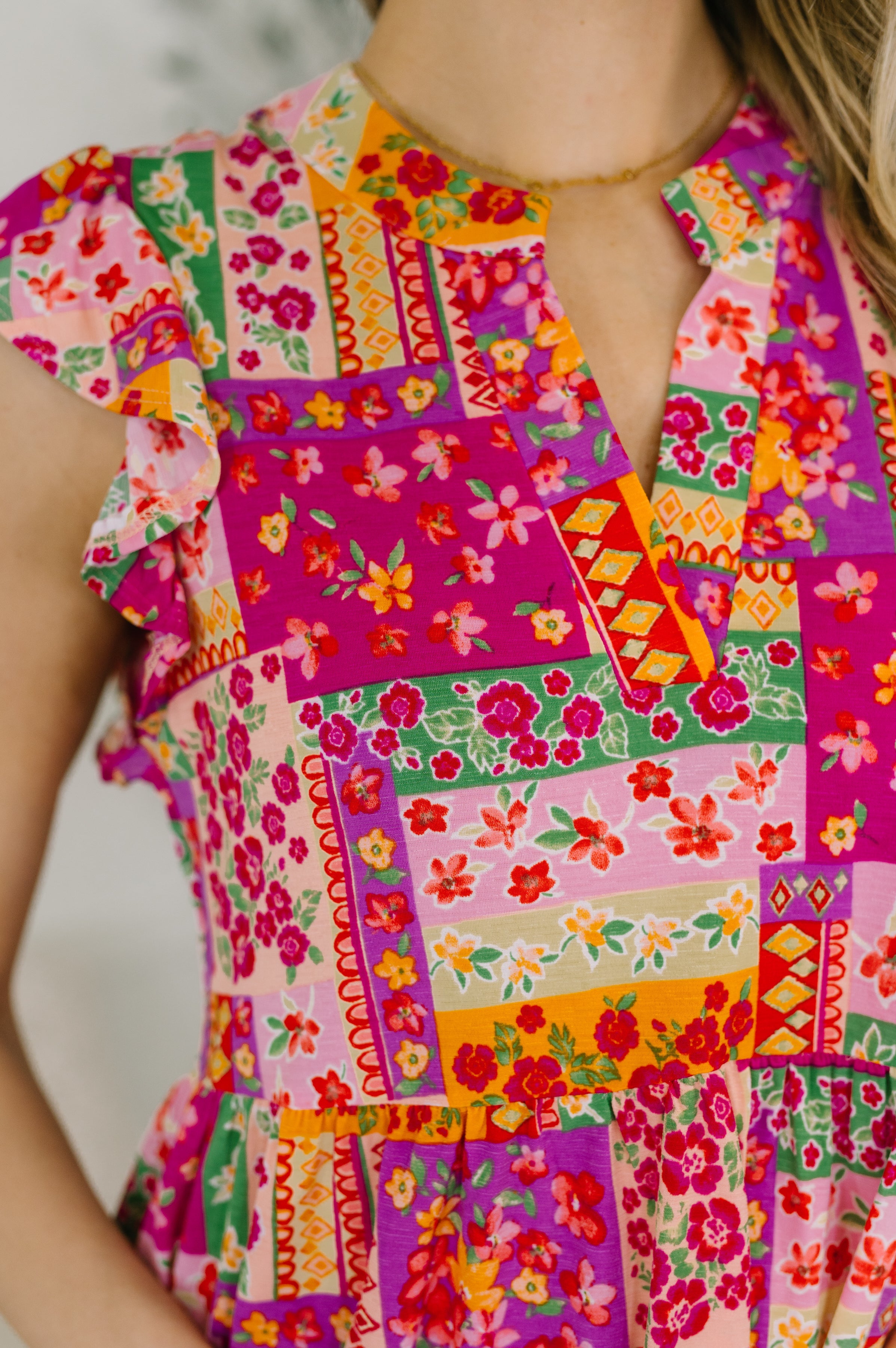 Lizzy Flutter Sleeve Dress in Patchwork Floral - Charming Charlie
