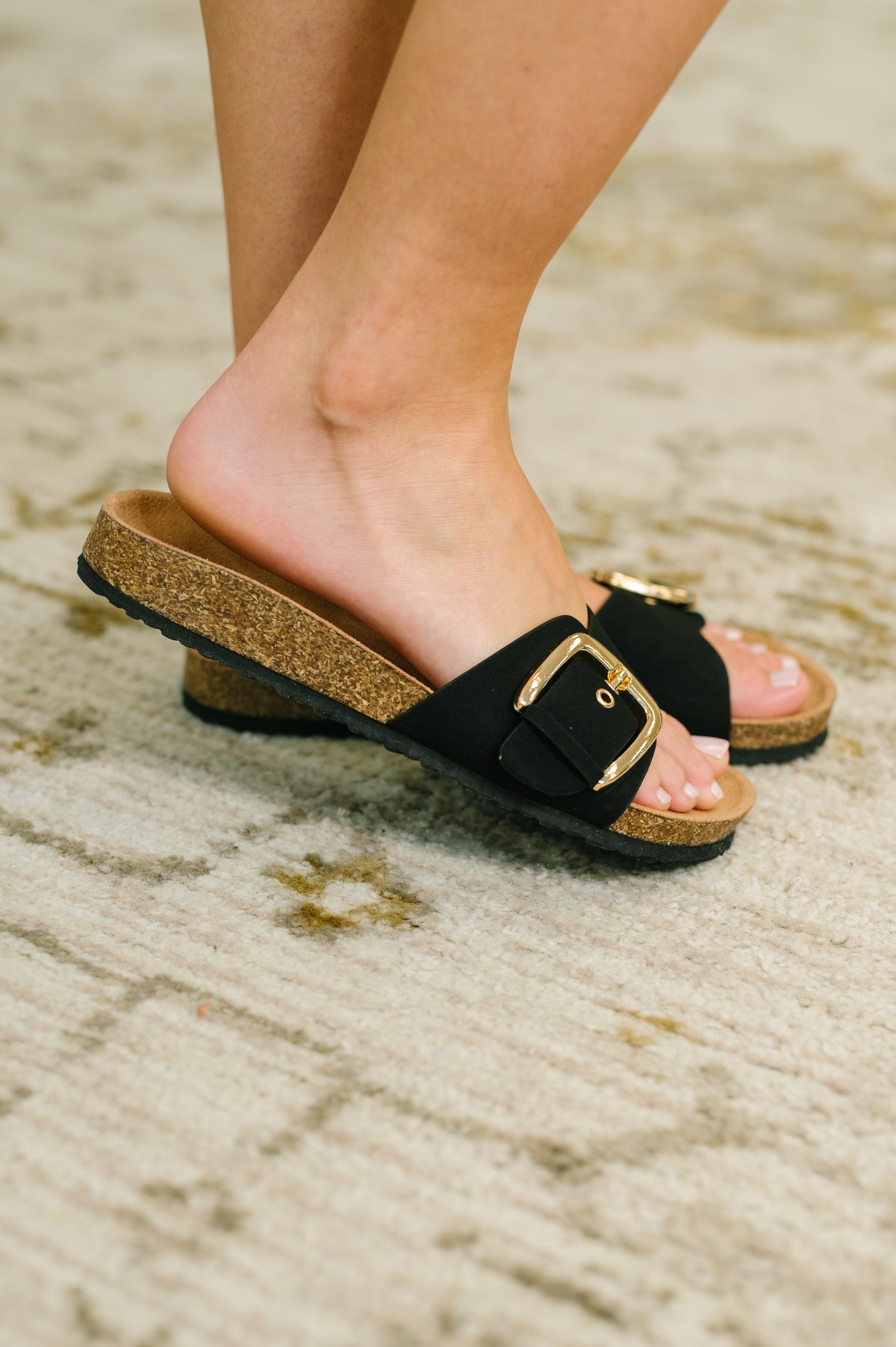 Lizzy Slip On Buckle Strap Sandal in Black - Charming Charlie