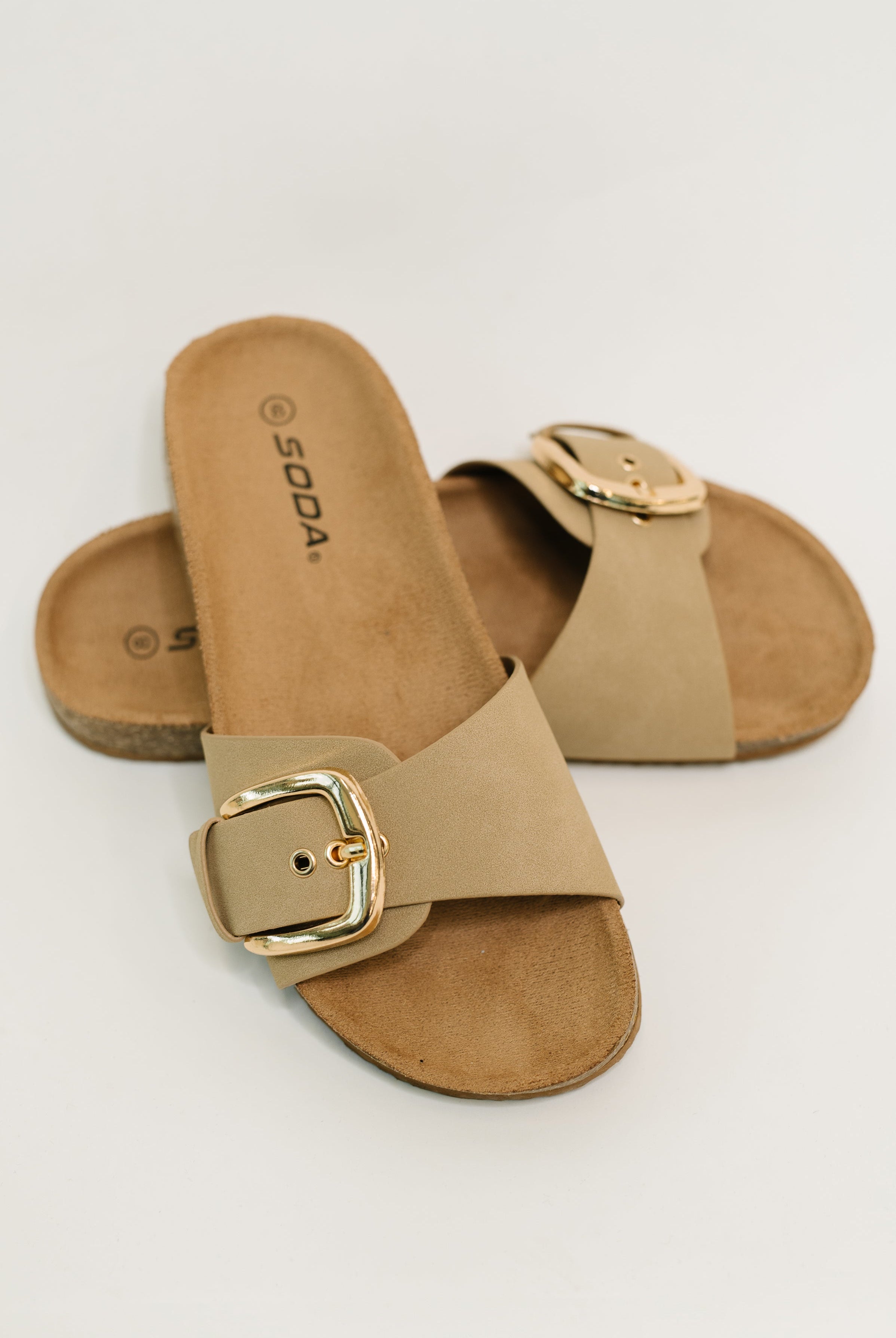 Lizzy Slip on Buckle Strap Sandal in Taupe - Charming Charlie