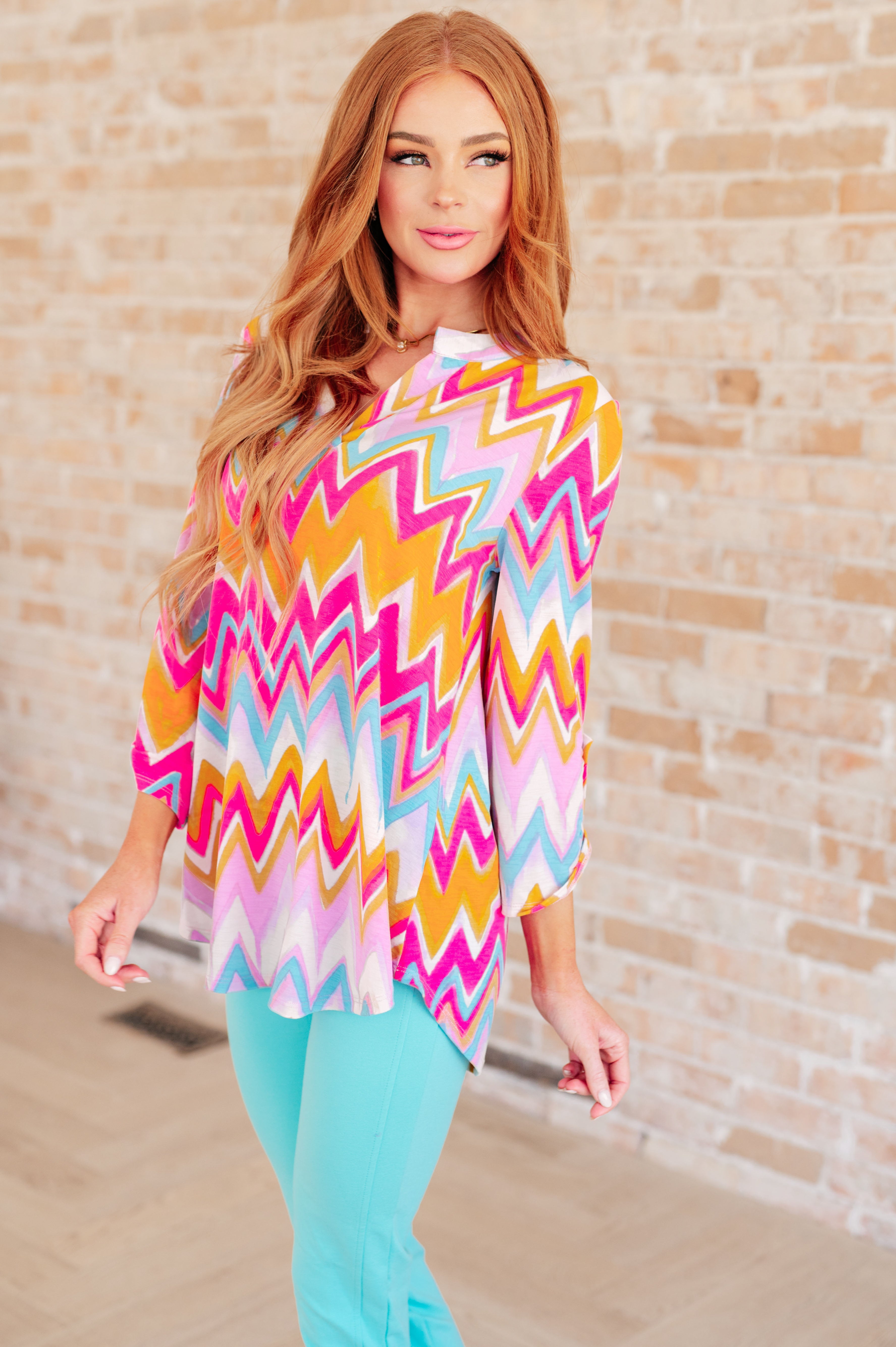 Lizzy Top in Orange Multi Chevron - Charming Charlie