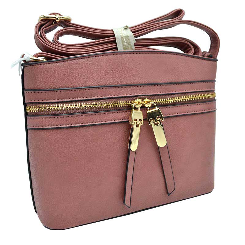 Mauve Zipper Detail Women's Crossbody Soft Leather Bag, These cross body bag is stylish daytime essential. Featuring one spacious big compartments and a shoulder strap. Show your trendy side with this awesome crossbody bag. perfectly lightweight to carry around all day. Hands-Free Cross-Body adds an instant runway style to your look, giving it ladylike chic. This handbag is destined to become your new favorite.