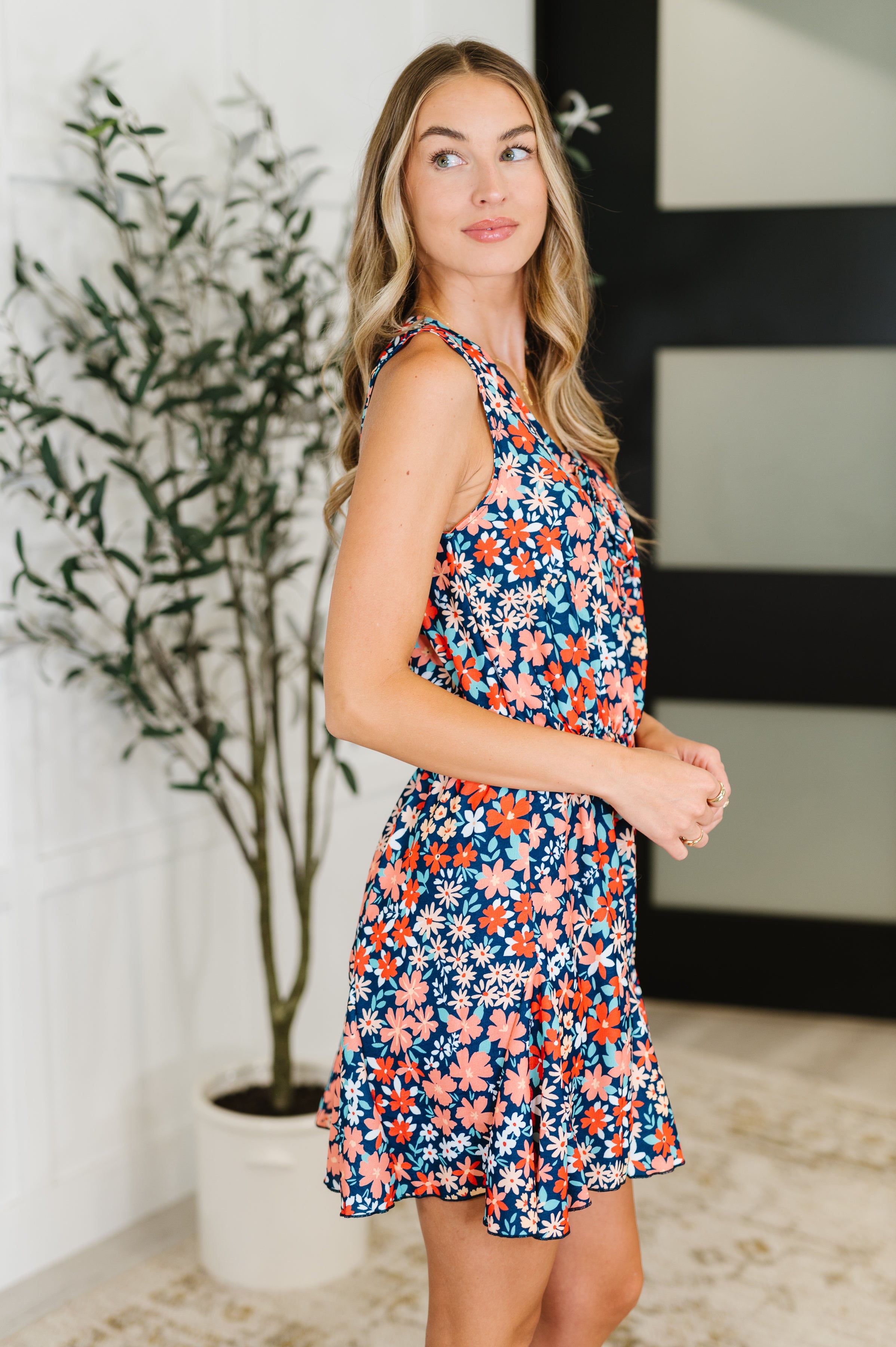 Meadow Mischief Sleeveless Romper in Navy/Orange/Teal - Charming Charlie