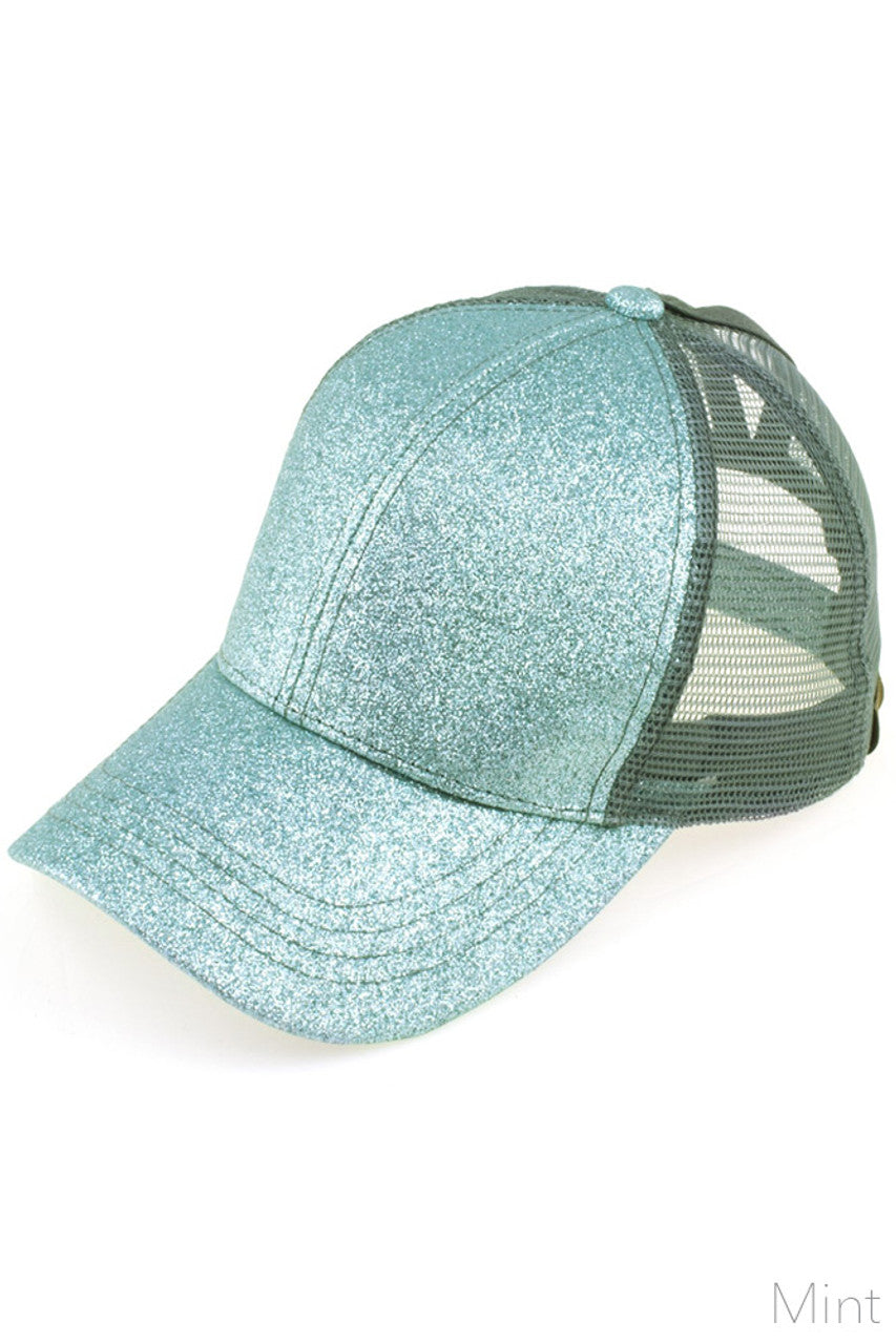 Mint C.C BASEBALL PONYCAP is a must-have accessory for any baseball fan. Made with high-quality materials, this cap offers both style and functionality. Featuring a ponytail holder, it allows for easy and comfortable wear while keeping your hair in place. Elevate your game day look with the C.C BASEBALL PONYCAP.