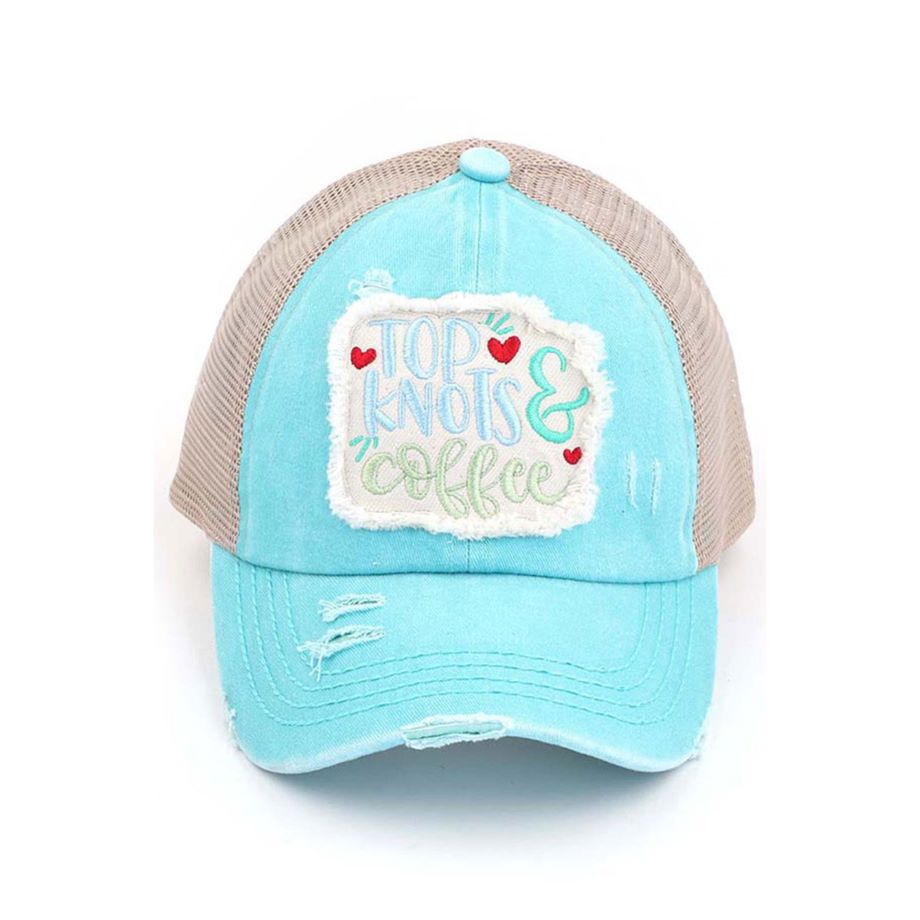 Mint C.C DISTRESSED TOP KNOTS AND COFFEE PATCH PONYCAP is an essential accessory for coffee lovers. Made with distressed fabric and a stylish top knot, it also features an embroidered coffee patch. Stay fashionable while showing off your love for coffee.
