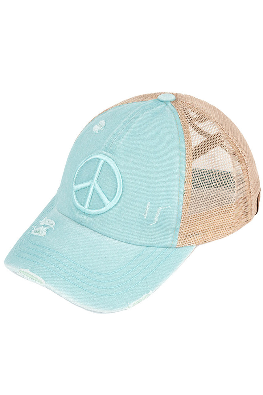 Mint C.C PEACE SIGN DISTRESSED PONY CAP - the perfect addition to your wardrobe for a trendy look. Made from high-quality materials, this cap features a peace sign design and distressed details that add character and edge to any outfit. Stay stylish and spread good vibes with this cap.