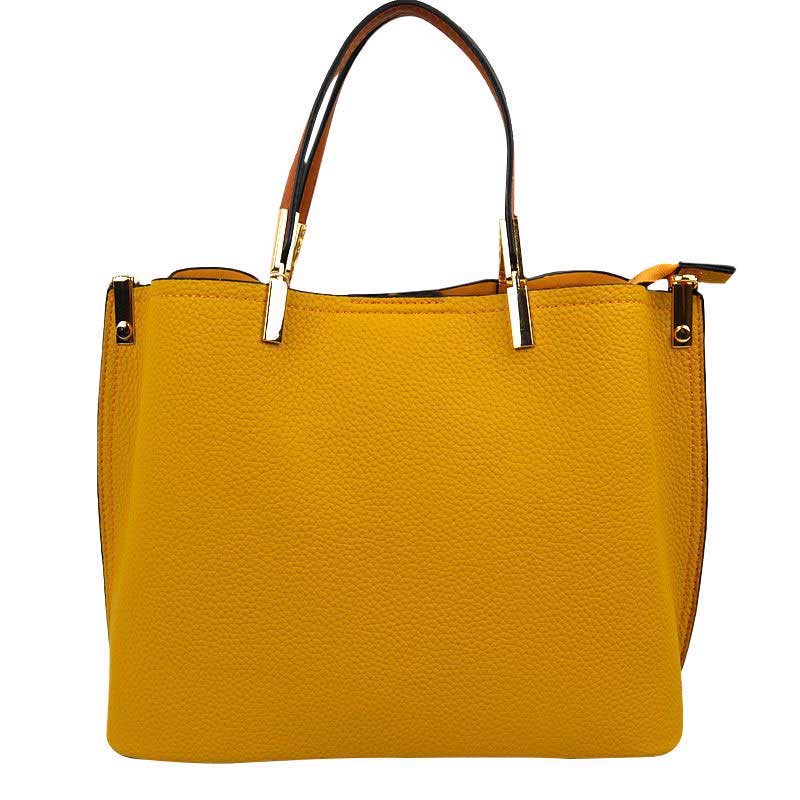 Mustard Simpler Times Bucket Crossbody Bags For Women. A great everyday casual shoulder bag composed of Faux leather. A simple design with subtle gold hardware details on the closure. Magnetic snap closure for an inner zipper pouch opening spacious to hold your phone, wallet, and other essentials securely.