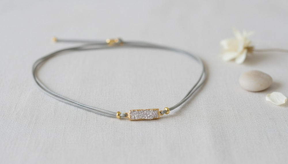 Cord Necklace with a Gold and Crystal Charm - Charming Charlie