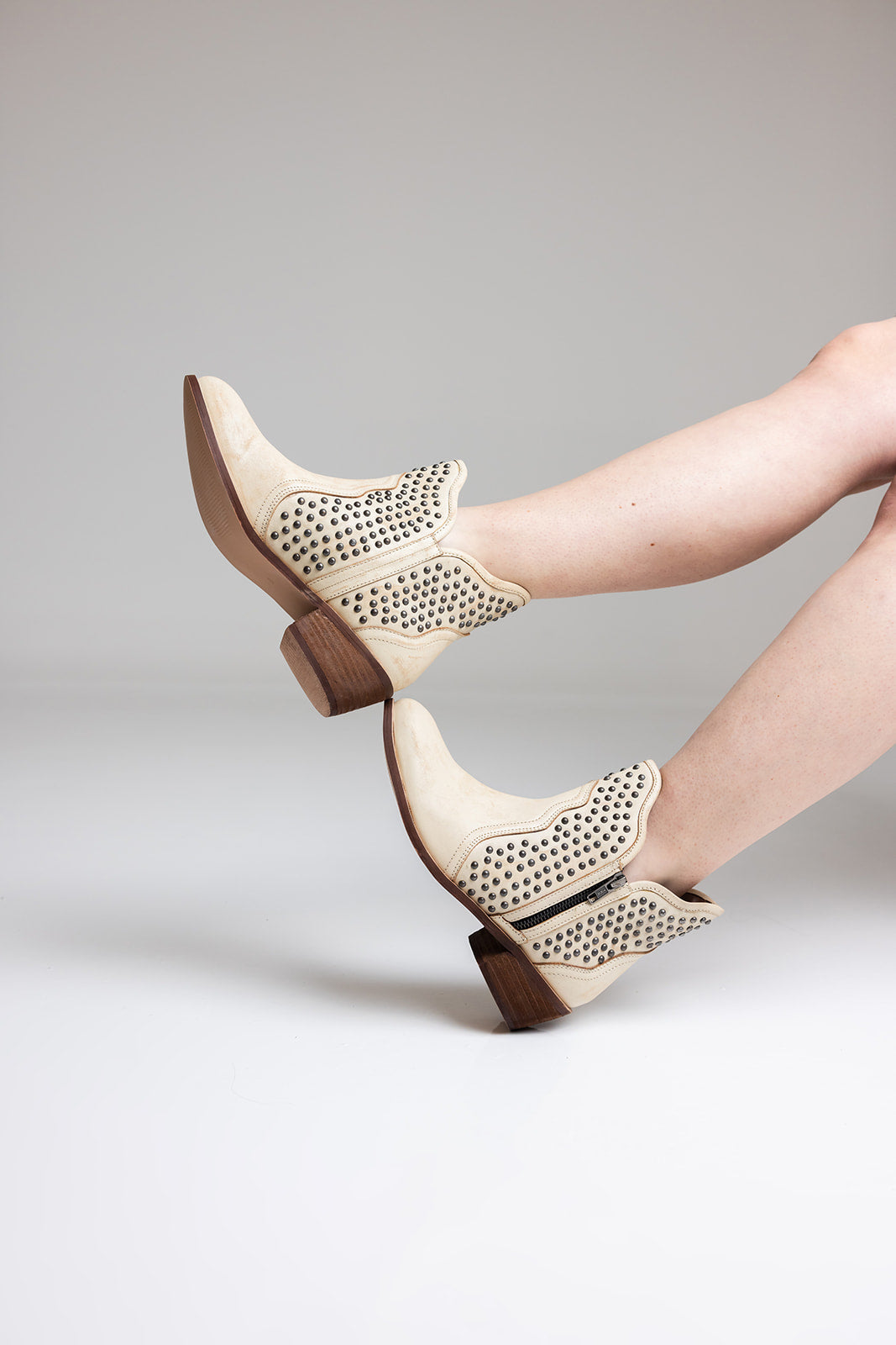 Nailed It Ankle Boot in White - Charming Charlie