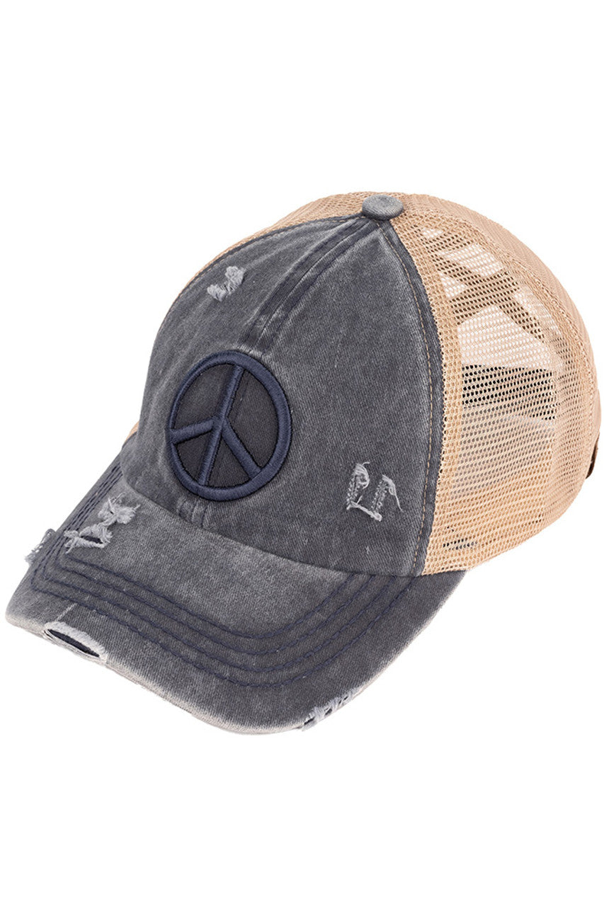 Navy C.C PEACE SIGN DISTRESSED PONY CAP - the perfect addition to your wardrobe for a trendy look. Made from high-quality materials, this cap features a peace sign design and distressed details that add character and edge to any outfit. Stay stylish and spread good vibes with this cap.