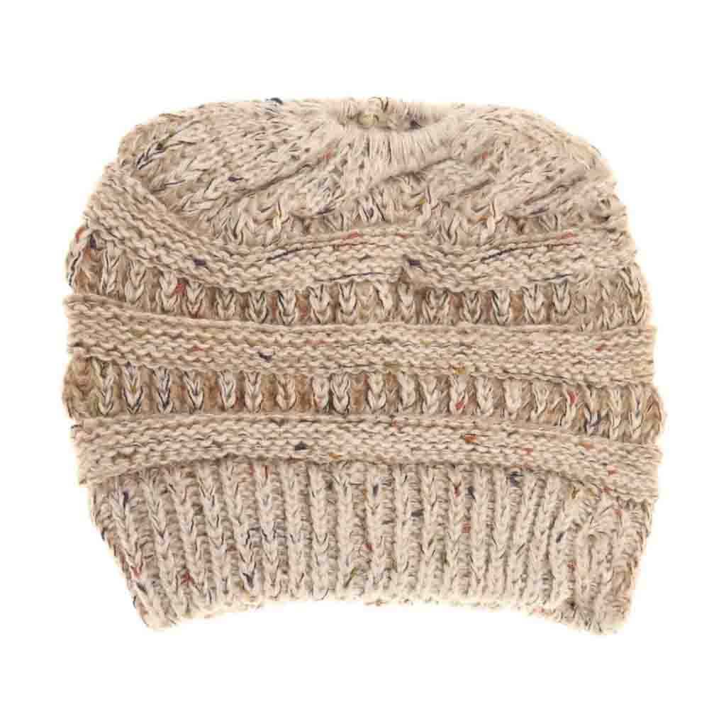 Oatmeal Flecked Ombre CC Beanie Tail offers expert craftsmanship with its soft, flecked yarn that creates a subtle ombre effect. Designed to comfortably fit all head sizes, this beanie tail provides warmth while allowing the perfect ponytail or bun to peek through, combining practicality with style. Ideal for cooler days, it’s a functional accessory that seamlessly blends comfort with a modern, casual look.