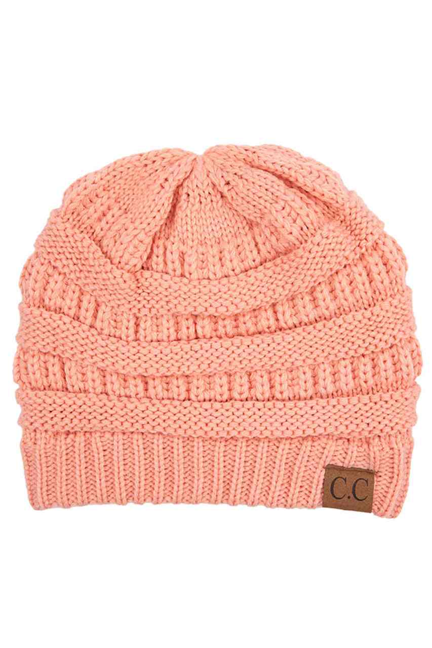 Peach C.C Ribbed Knit Solid Color Beanie offers a timeless design with durable ribbed knitting, ensuring a snug and comfortable fit. Crafted for warmth and versatility, this beanie is perfect for everyday wear, providing reliable protection against cold weather while maintaining a sleek, minimalist style that complements any outfit. Its solid color adds understated appeal, making it an essential accessory for both casual and outdoor use.
