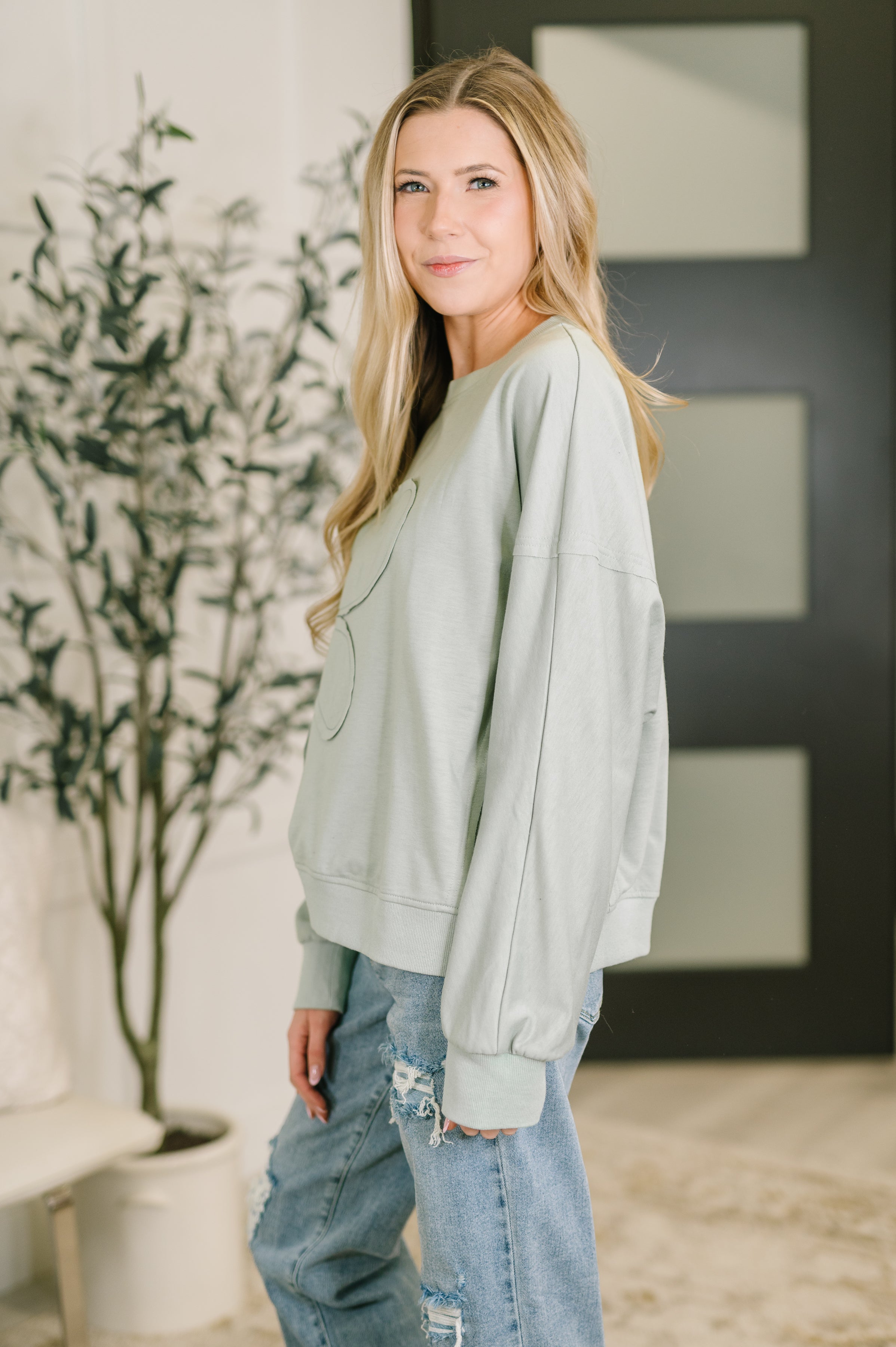 Petal Poise Floral Applique Pullover in Ivy - Charming Charlie