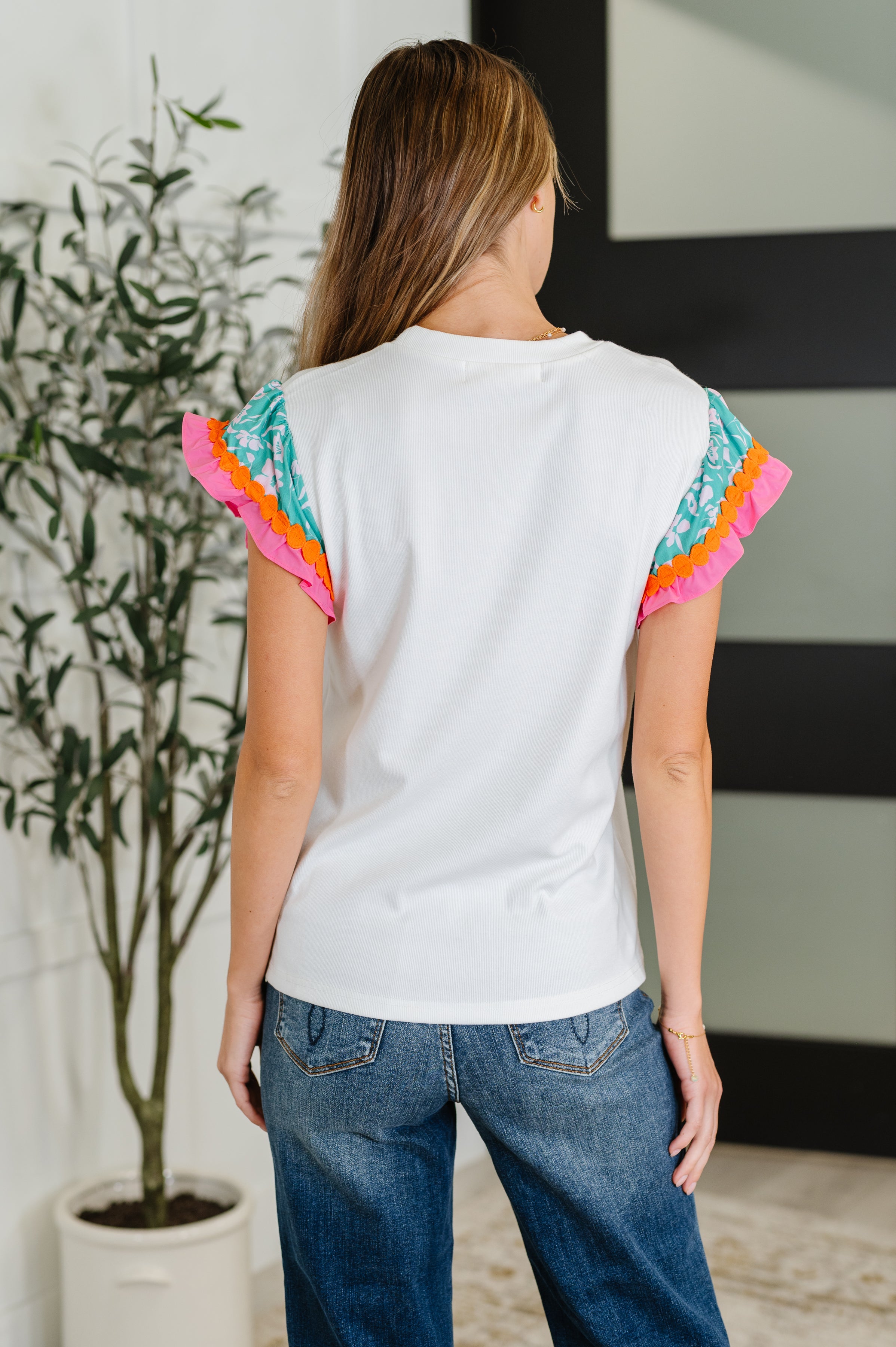 Petals & Poise Floral Flutter Sleeve Top in White - Charming Charlie