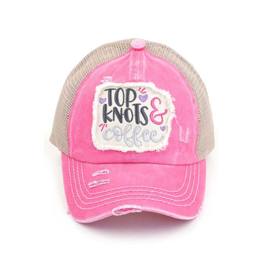 Pink C.C DISTRESSED TOP KNOTS AND COFFEE PATCH PONYCAP is an essential accessory for coffee lovers. Made with distressed fabric and a stylish top knot, it also features an embroidered coffee patch. Stay fashionable while showing off your love for coffee.