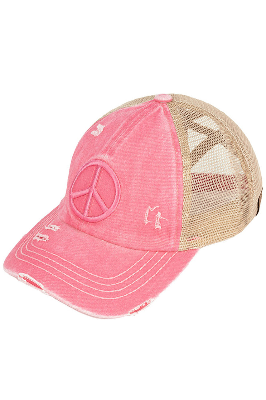 Pink C.C PEACE SIGN DISTRESSED PONY CAP - the perfect addition to your wardrobe for a trendy look. Made from high-quality materials, this cap features a peace sign design and distressed details that add character and edge to any outfit. Stay stylish and spread good vibes with this cap.