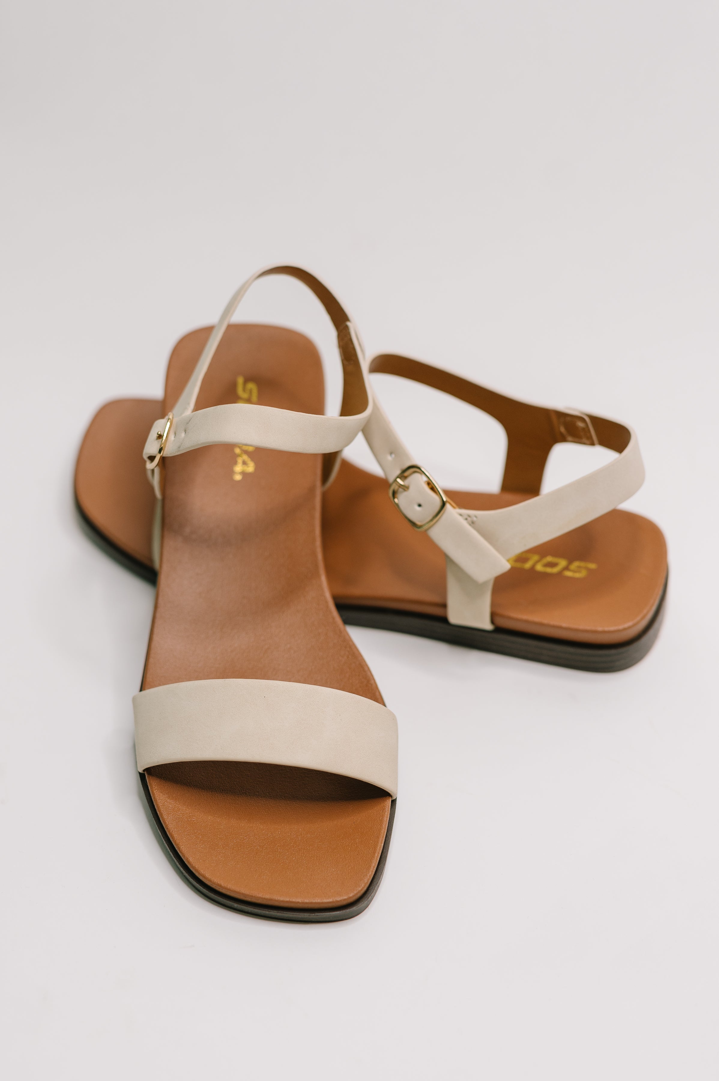 Riddle Ankle Strap Sandal in Beige - Charming Charlie