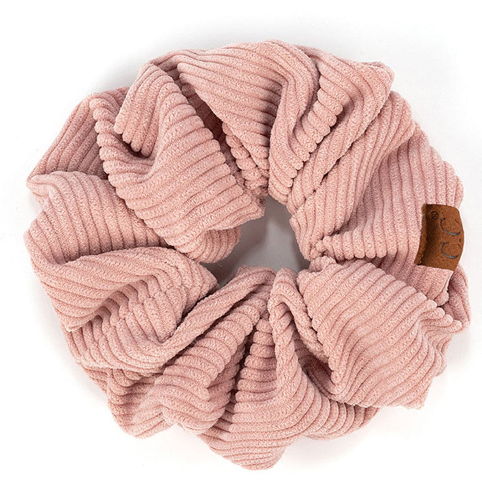 Rose C.C Corduroy Solid Color Soft Scrunchies are a must-have for any hair accessory collection. Made from soft and durable corduroy material, these scrunchies are perfect for any hair type and can hold hair in place comfortably without causing any damage. Add some style to your hairstyle with these versatile and fashionable scrunchies.