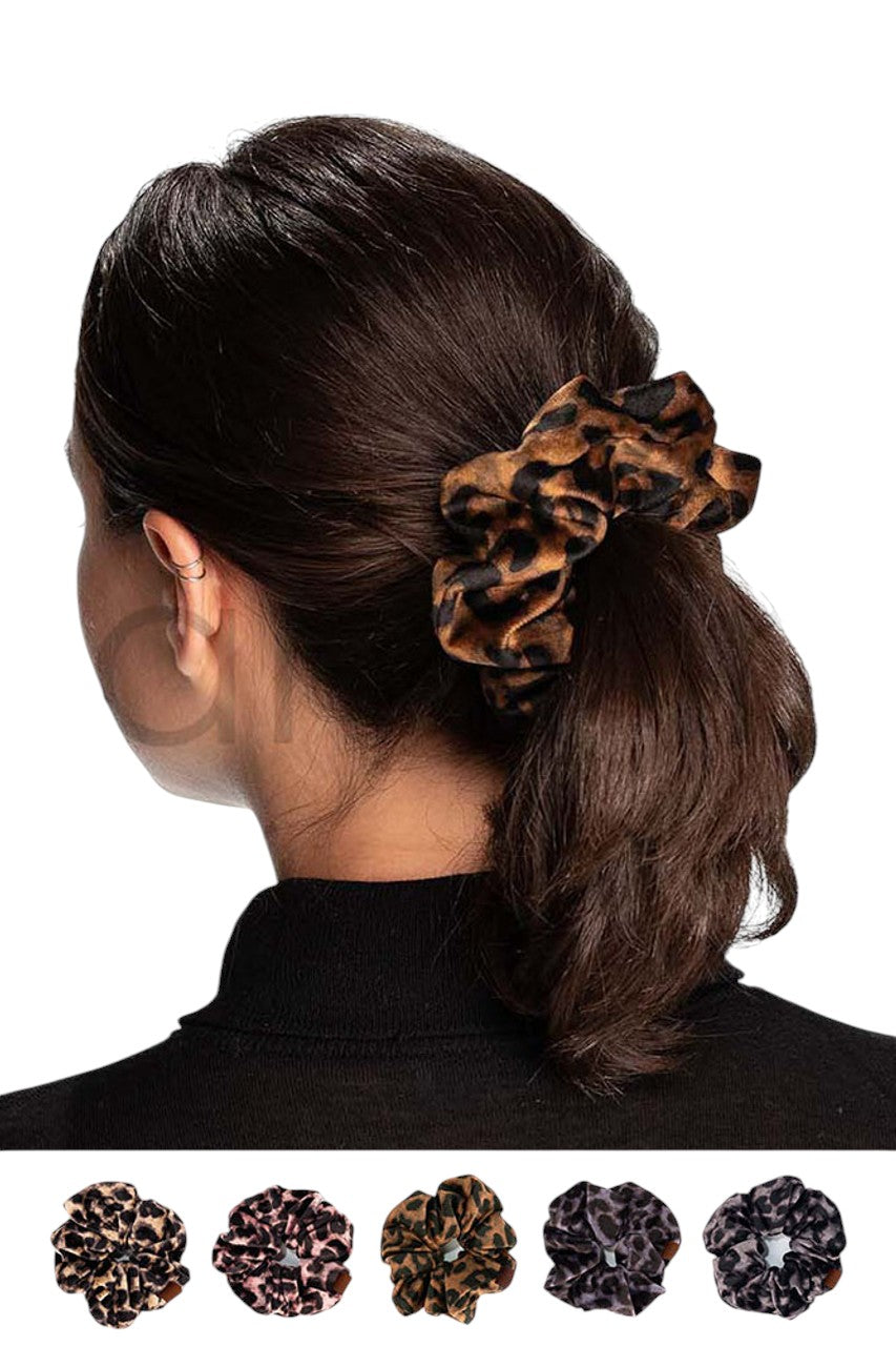 Rose C.C Leopard Velvet Scrunchies are the perfect addition to your hair accessory collection. Made with luxurious velvet material, these scrunchies provide a soft and comfortable hold for all hair types. With their trendy leopard print design, they add a touch of style to any outfit. Upgrade your hair game with these must-have scrunchies!