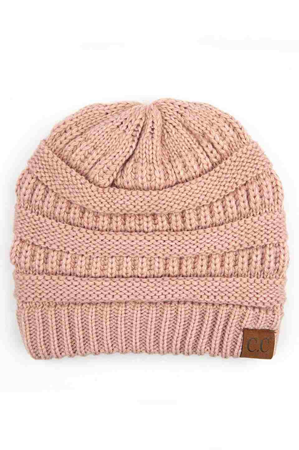 Rose C.C Ribbed Knit Solid Color Beanie offers a timeless design with durable ribbed knitting, ensuring a snug and comfortable fit. Crafted for warmth and versatility, this beanie is perfect for everyday wear, providing reliable protection against cold weather while maintaining a sleek, minimalist style that complements any outfit. Its solid color adds understated appeal, making it an essential accessory for both casual and outdoor use.